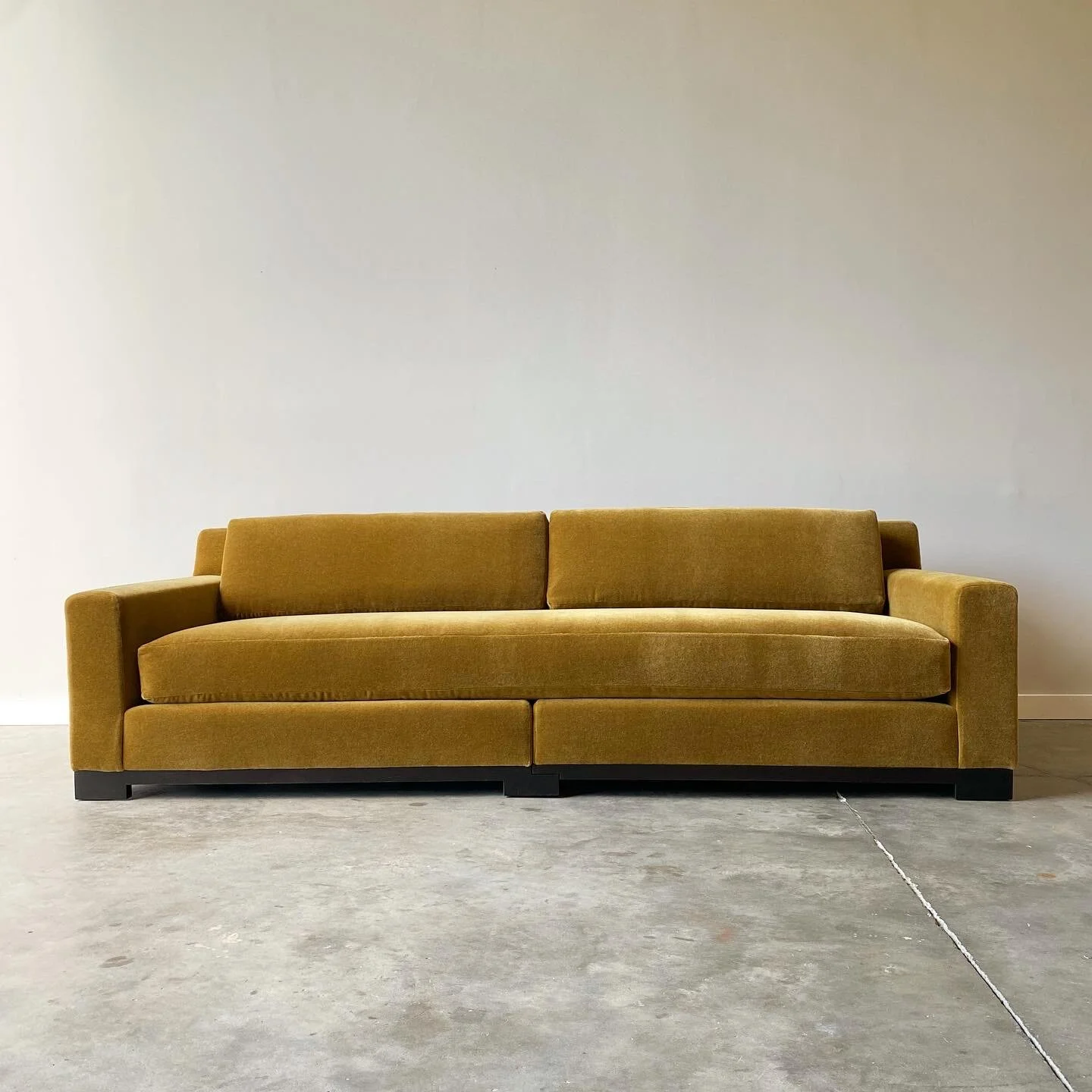 Mid-century modern couch for sale in Raleigh north carolina. This sofa was made by designer Christian Liaigre for Holly Hunt.