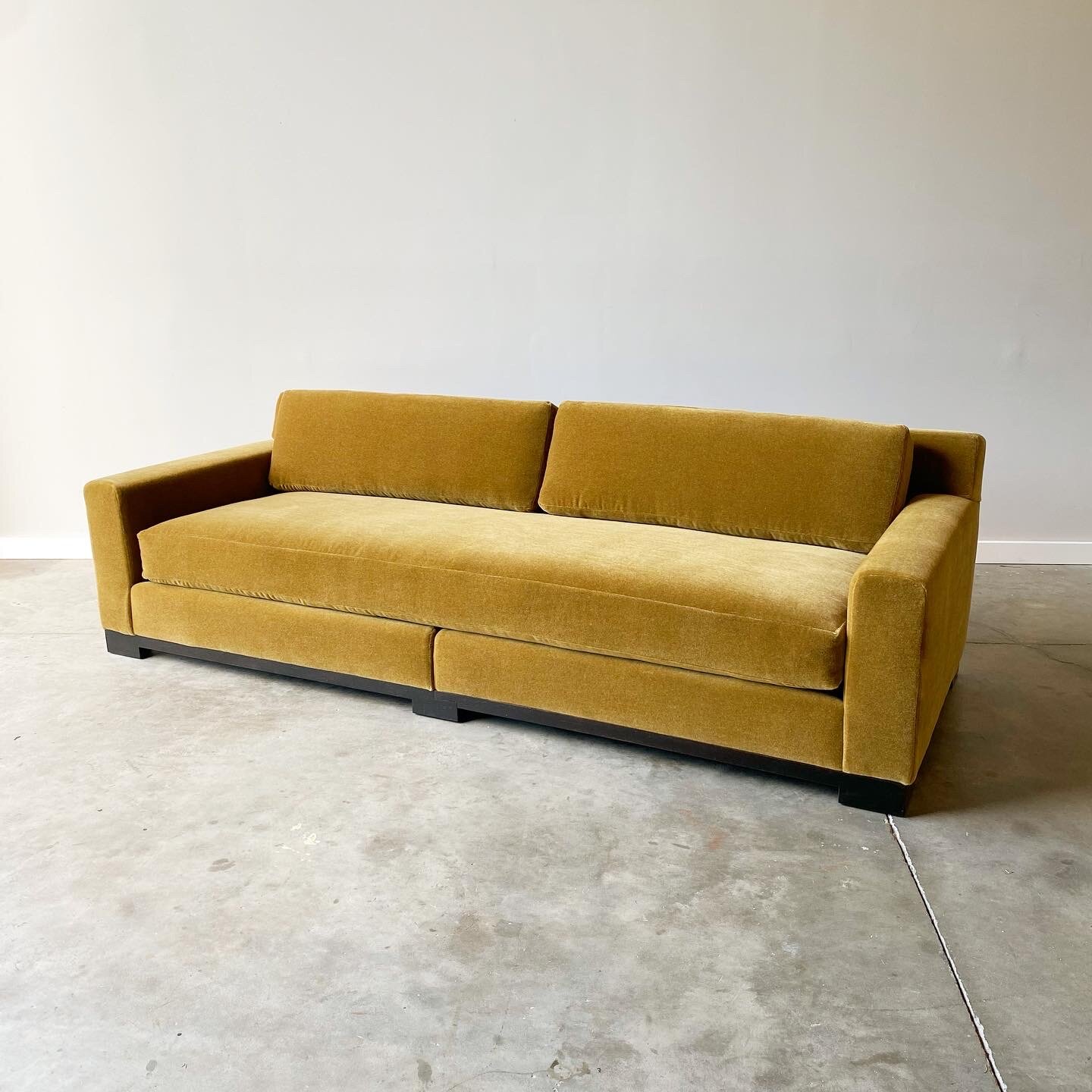 Mid-century modern couch for sale in Raleigh north carolina. This sofa was made by designer Christian Liaigre for Holly Hunt.