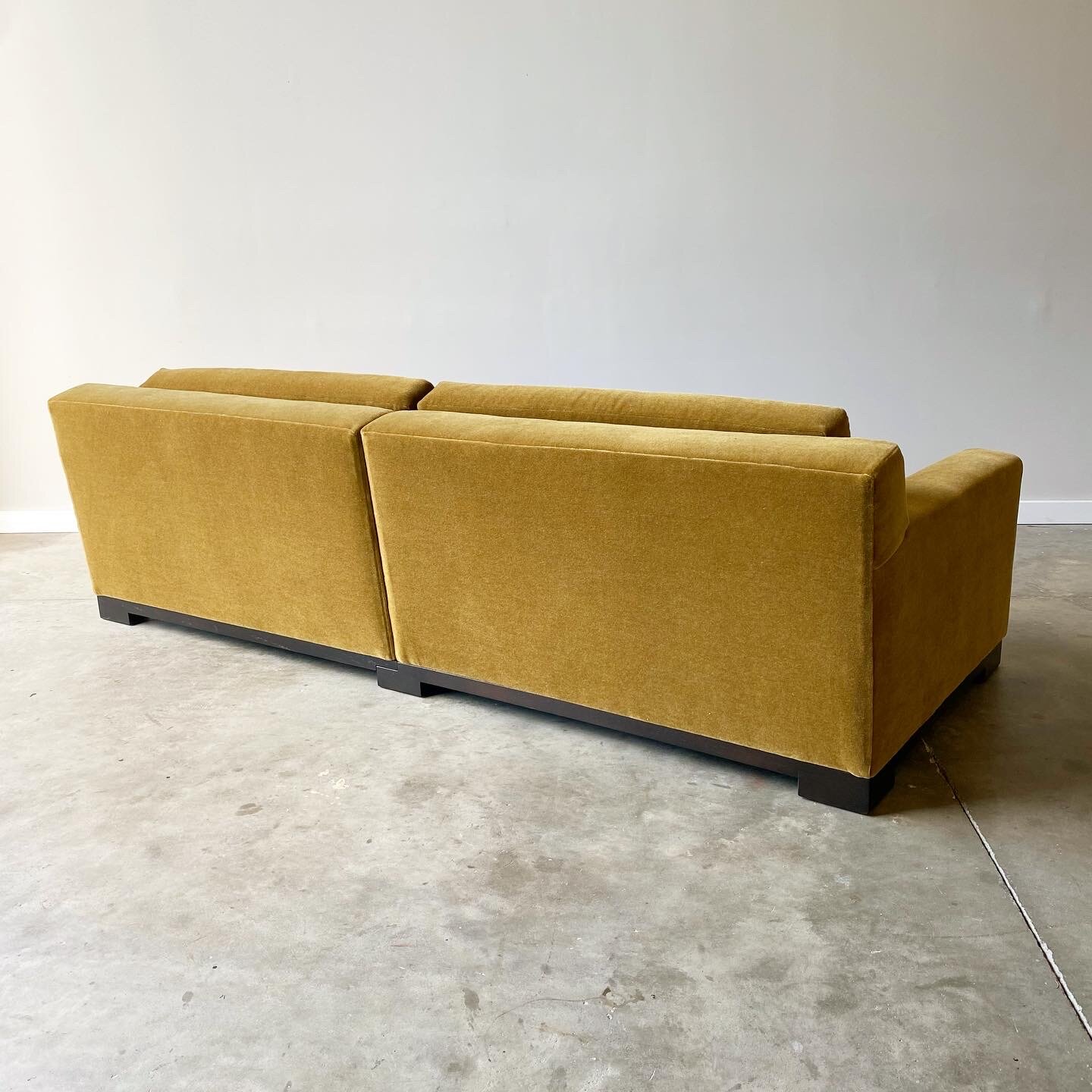 Beutiful example of MCM sofa Mid-century modern couch for sale in Raleigh north carolina. This sofa was made by designer Christian Liaigre for Holly Hunt.