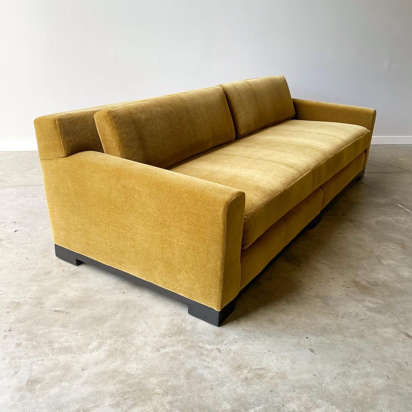 Mid-century modern couch for sale in Raleigh north carolina. This sofa was made by designer Christian Liaigre for Holly Hunt.