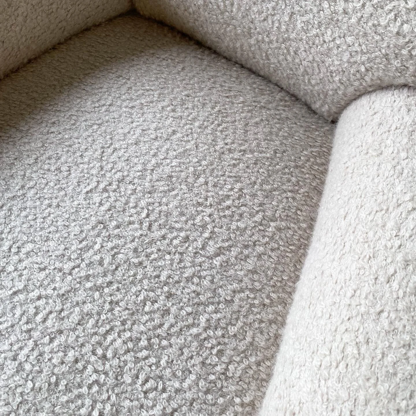 overhead detail of A dynamic pair of mid century Italian armchairs. In the style of Gio Ponti these have a cozy feel and sculptural silhouett