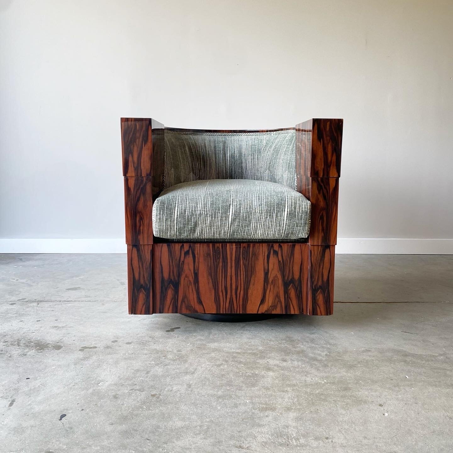Front view A stunning vintage example newly upholstered. Striking Macassar ebony case with gloss lacquer finish. 1970s swivel chair from Pace Furniture.  Minor imperfections to the case.