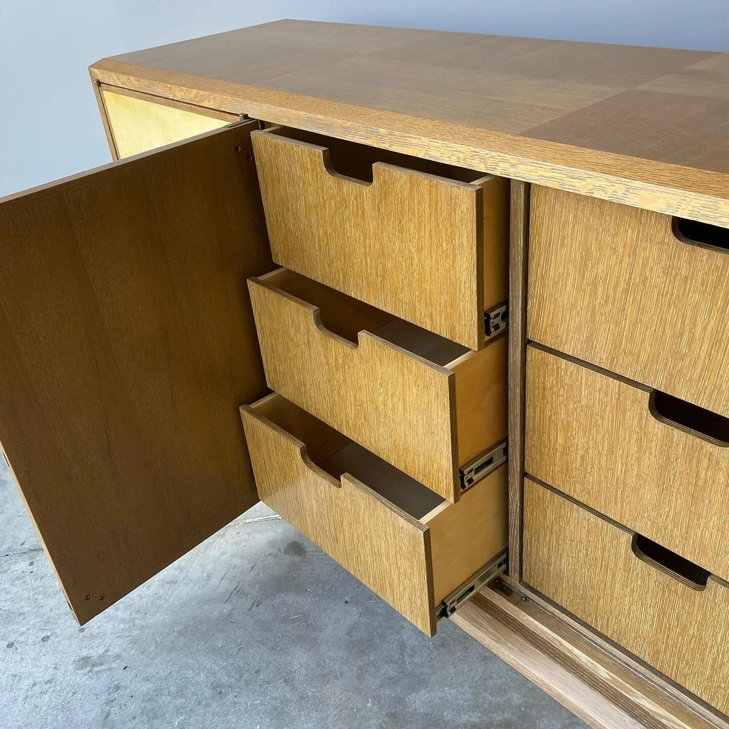 inside look at Tommi Parzinger Style Credenza