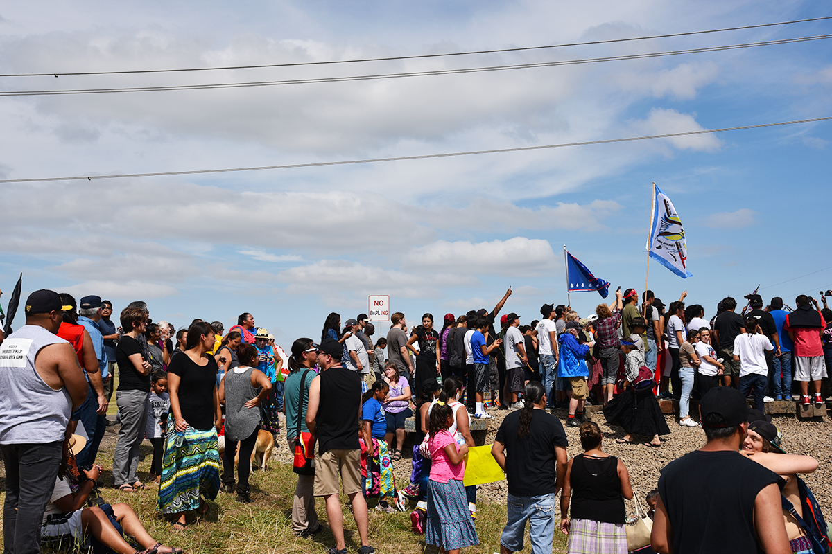 At the gate, after they prayers, before the protectors moved further down the road