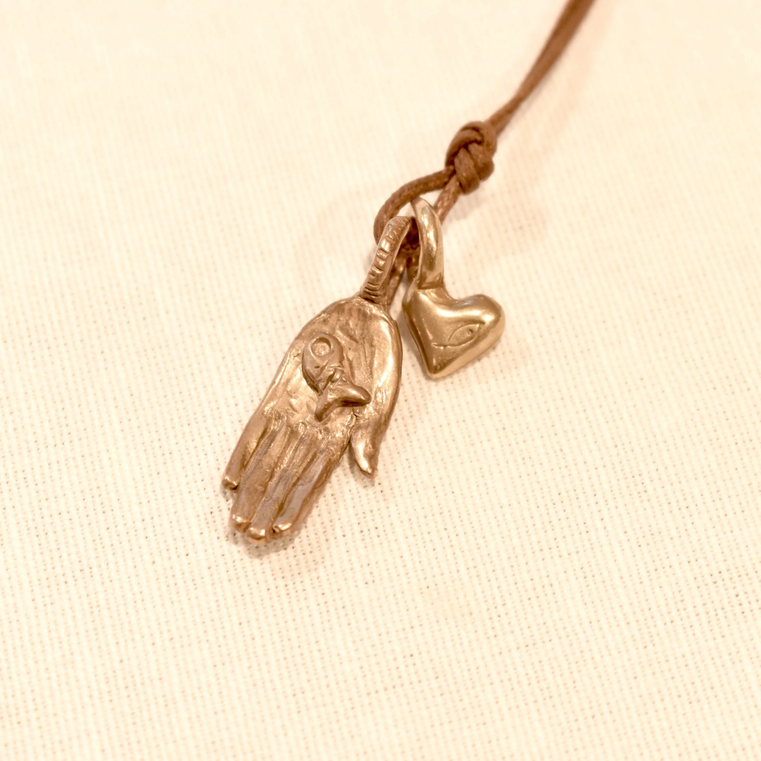 Bronze Hand + Heart Pendant