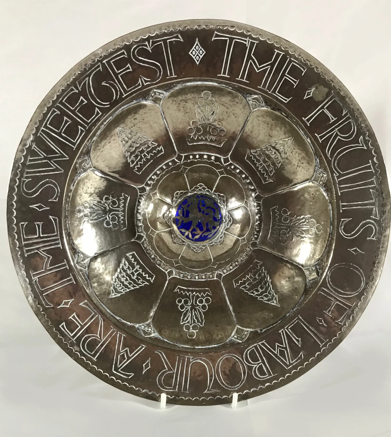 An arts and crafts silvered copper rosewater dish