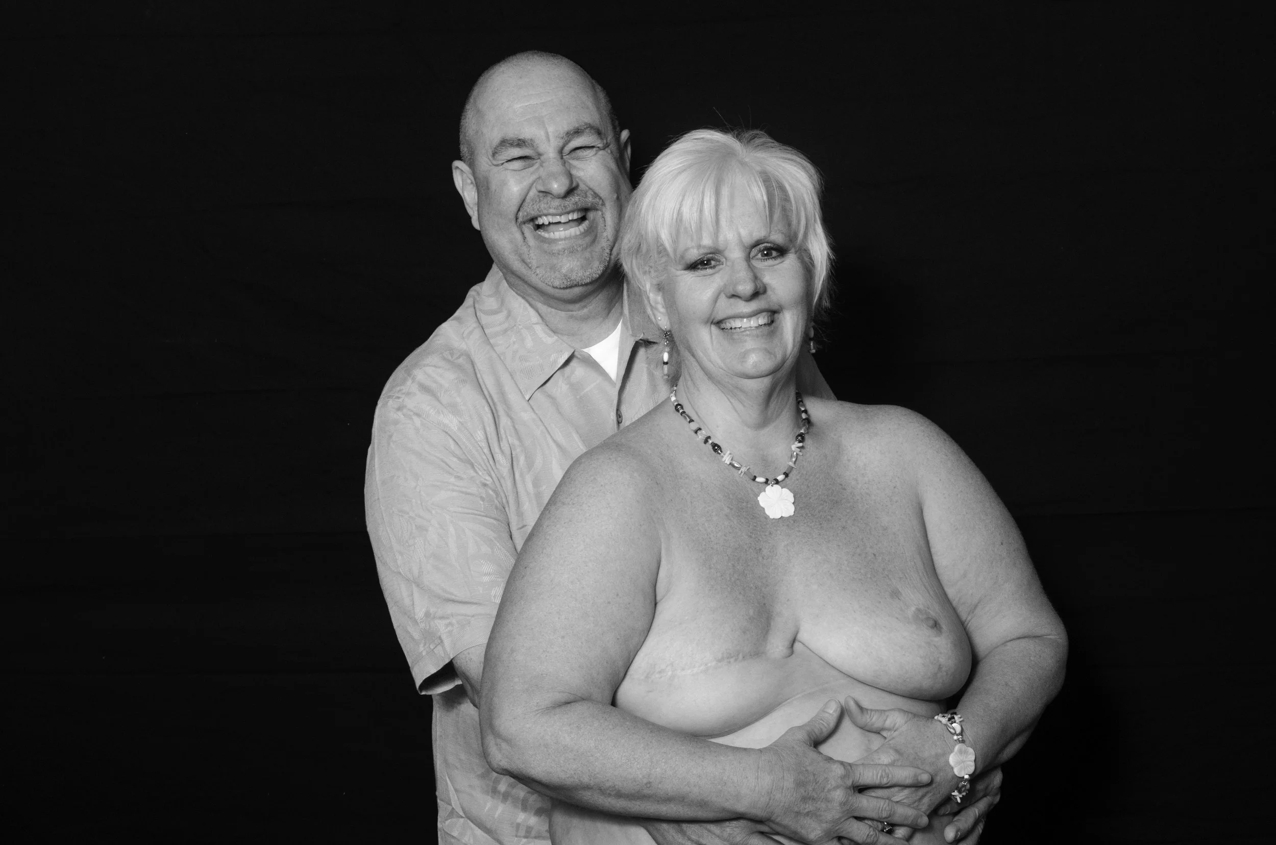 After meeting with Betsy she wanted my wife and I to meet her husband and now 24 year old son. They sat and told us the cancer story from their perspective. When it came time to do the photo she wanted her husband in it with her. It is obvious why she was concerned about his heart. It totally belongs to her.