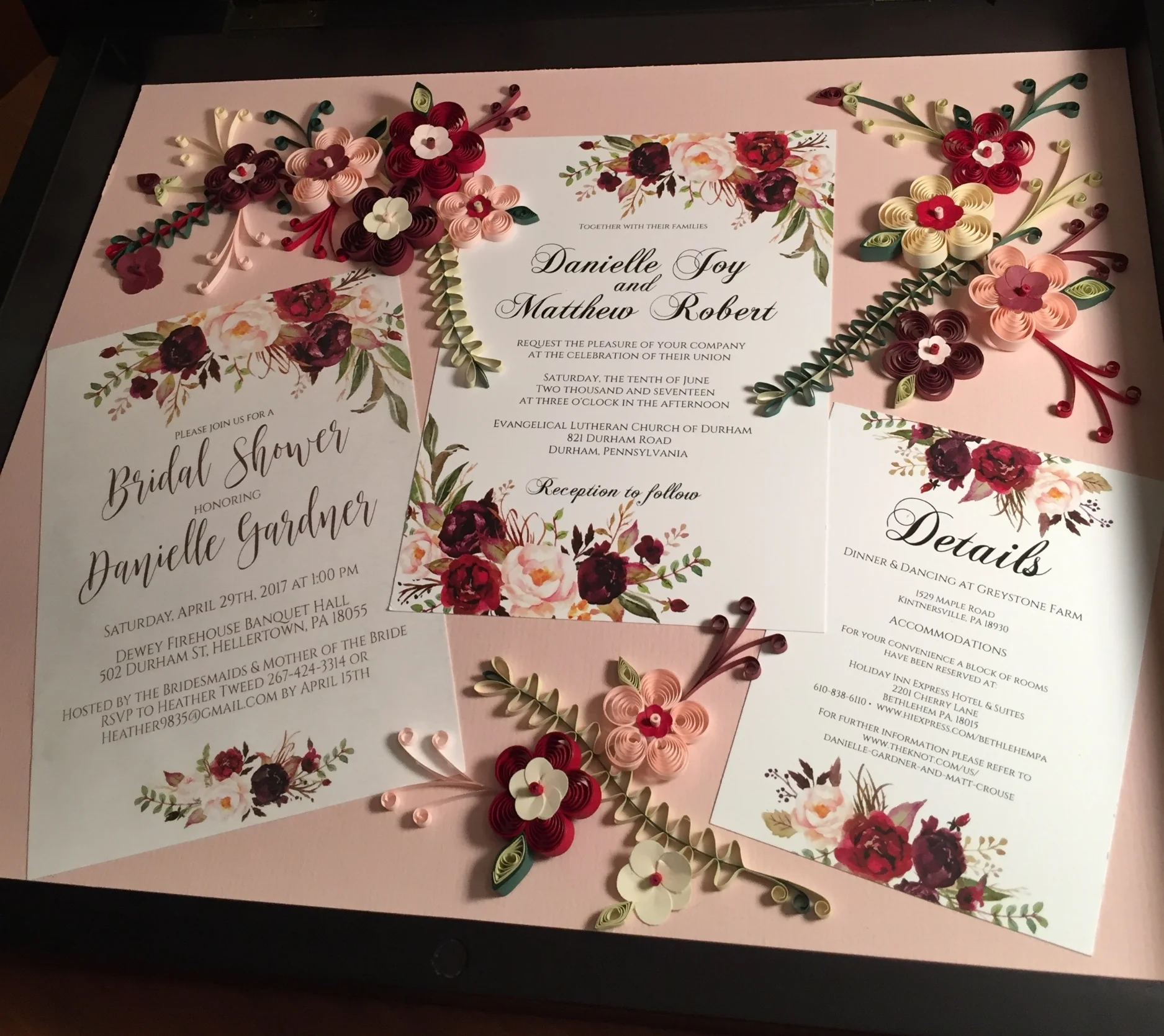   Wedding ensemble including the bridal shower invitation, the wedding invitation and the details of the wedding reception. The quilled flowers are made to match the floral decorations on the wedding invitation.  