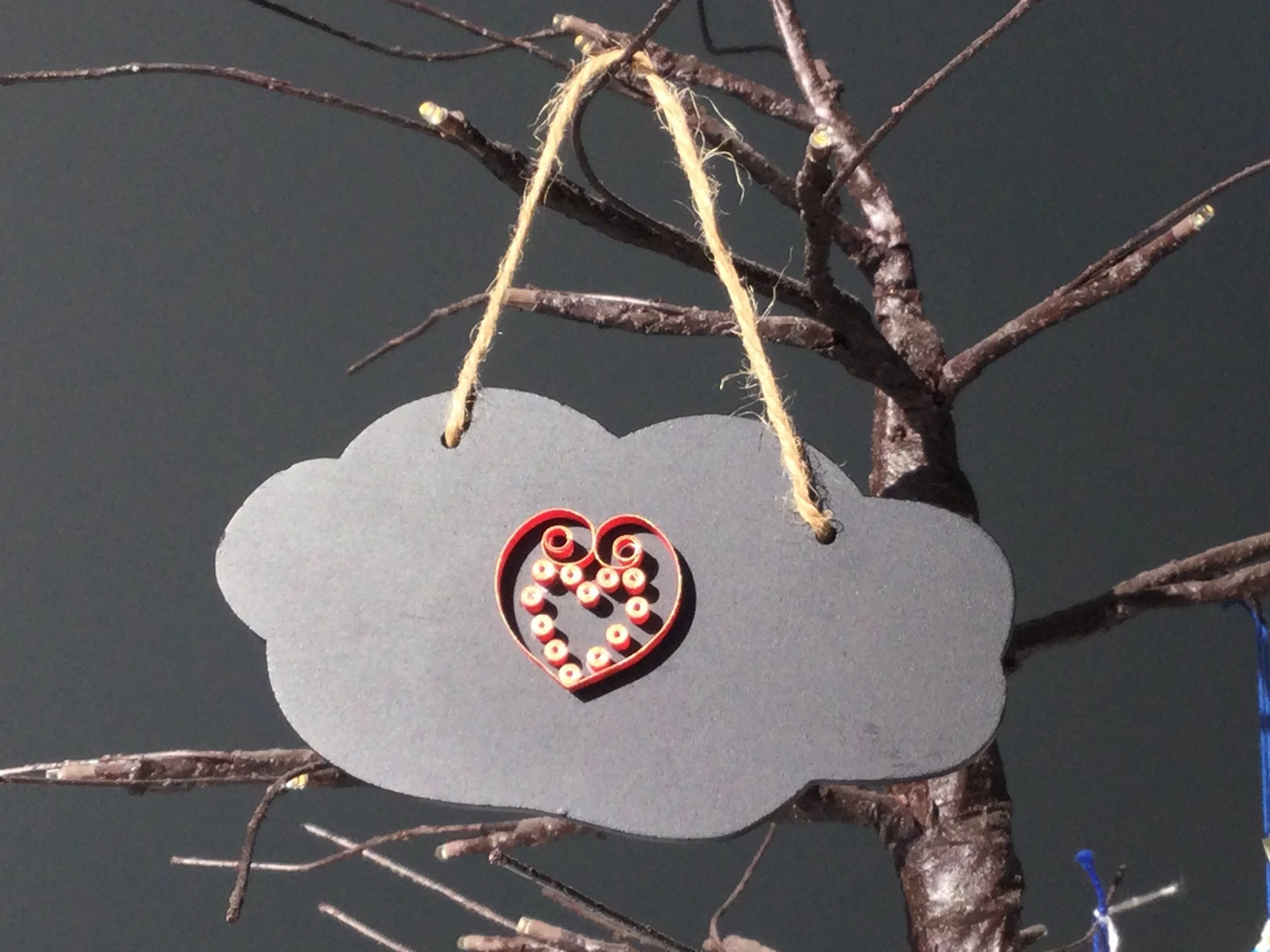 Red heart on scalloped chalkboard