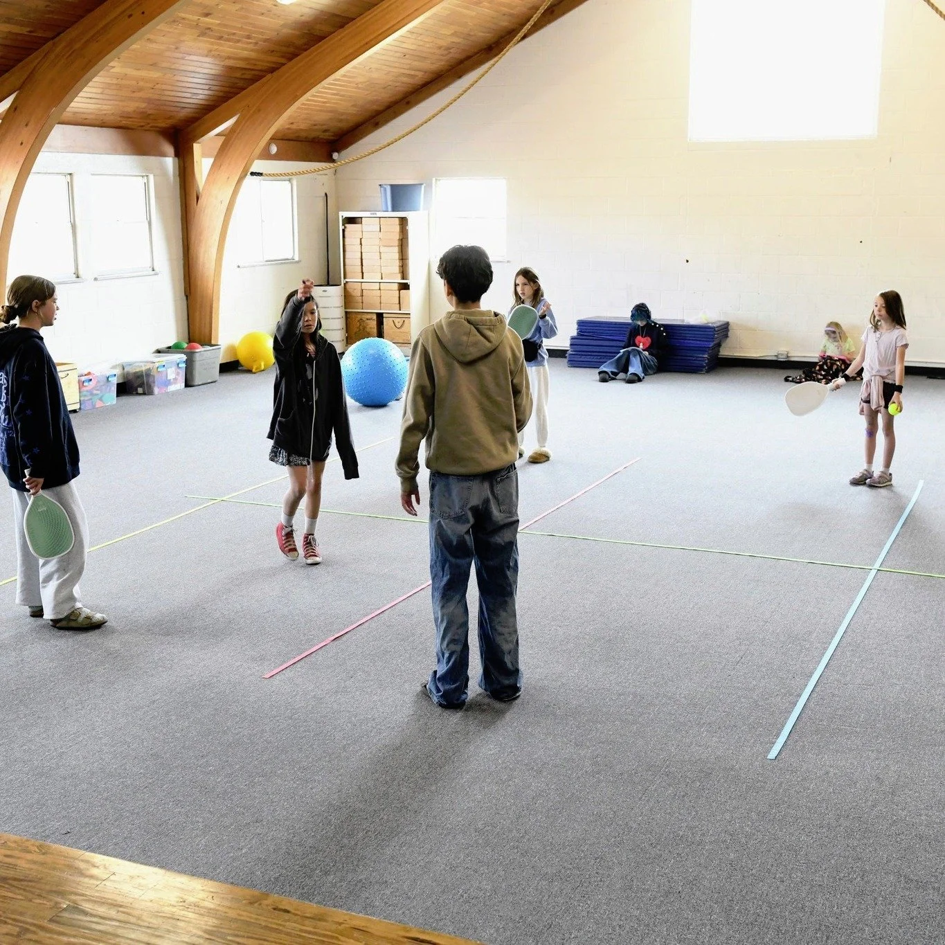 What a week! 🌊

Water balloon fights basically became a daily tradition (weather permitting), a student brought in a vintage reel-to-reel projector to screen a film for the community, and when the wind had other plans for pickleball, students just..