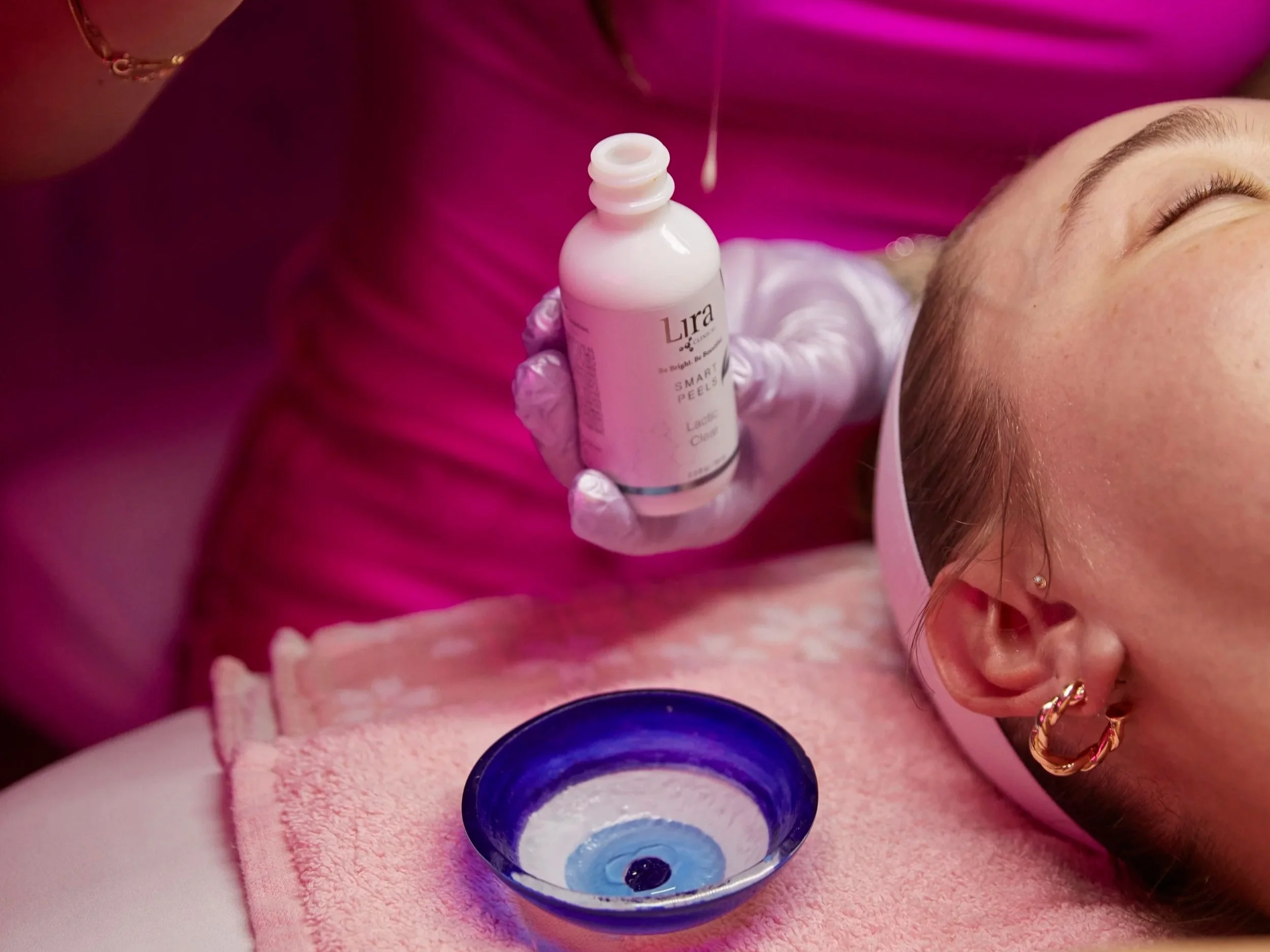 Esthetician prepping a facial