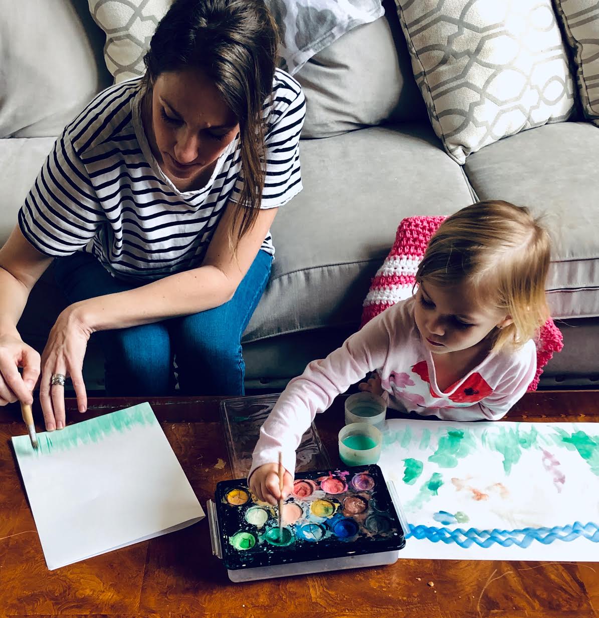 Ivy and I working on painting our flowers.