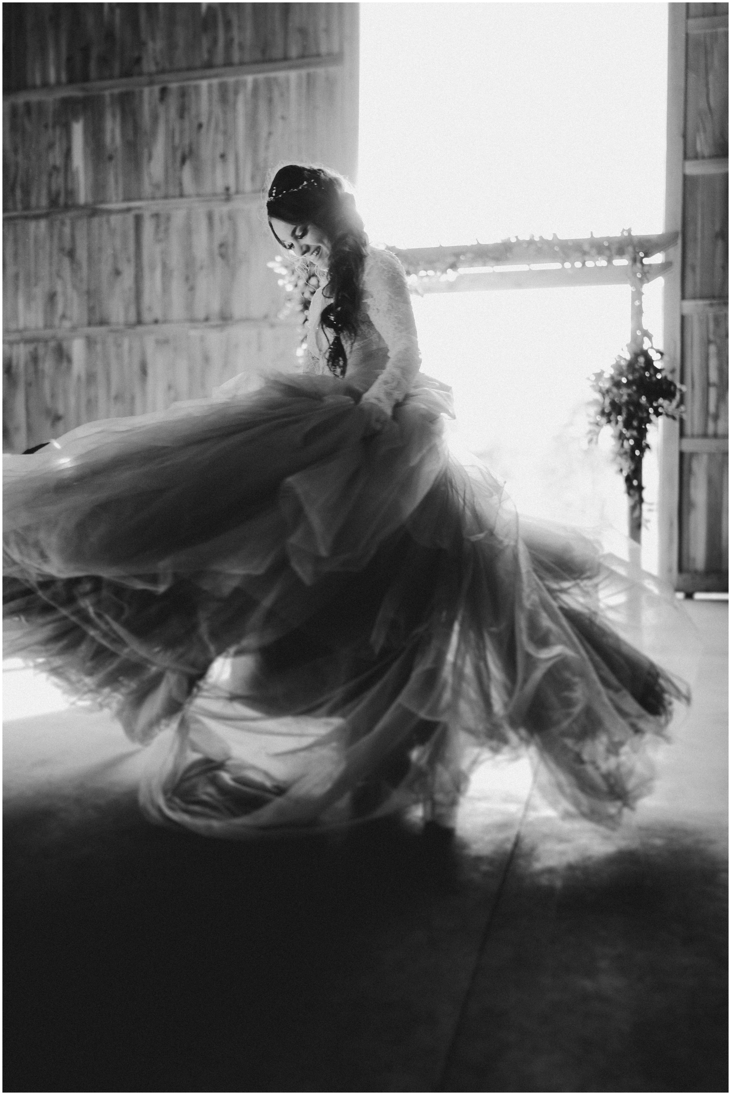 TONY-GAMBINO-PHOTOGRAPHY-BEND-OREGON-WEDDING-SHOOT-000_1542 bride spinning dress.jpg