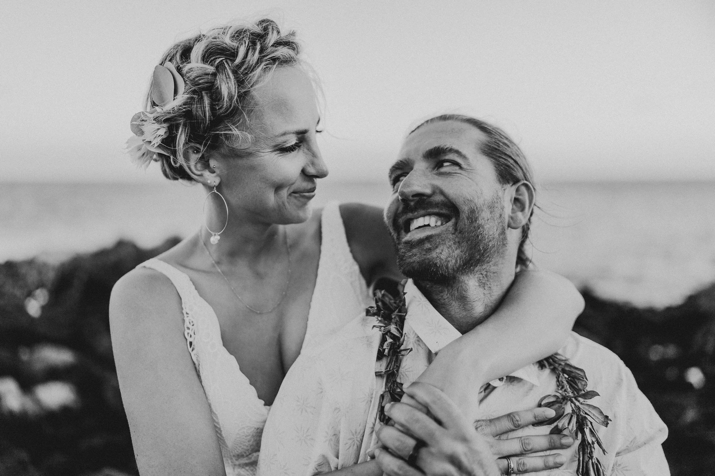 Couple embracing in Central Oregon, photographed by Bend wedding and elopement photographer Tony Gambino.