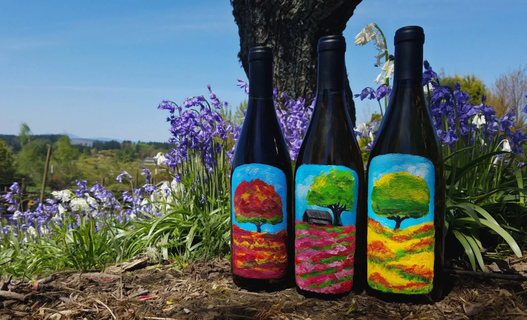HAND PAINTED BY MAXINE K ADDINGTON. RE-USABLE ART, DISHWASHER SAFE TOP RACK. BOTTLED WINE PURCHASES AT SPRINGHILL CELLARS, ALBANY