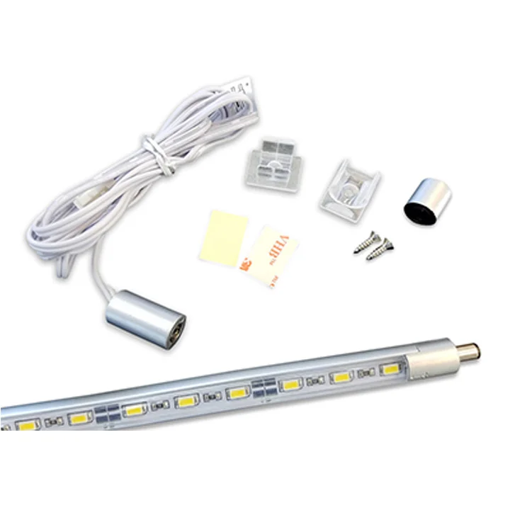 LED light bar kit with power cable, mounting clips, adhesive pads, end caps, and screws.