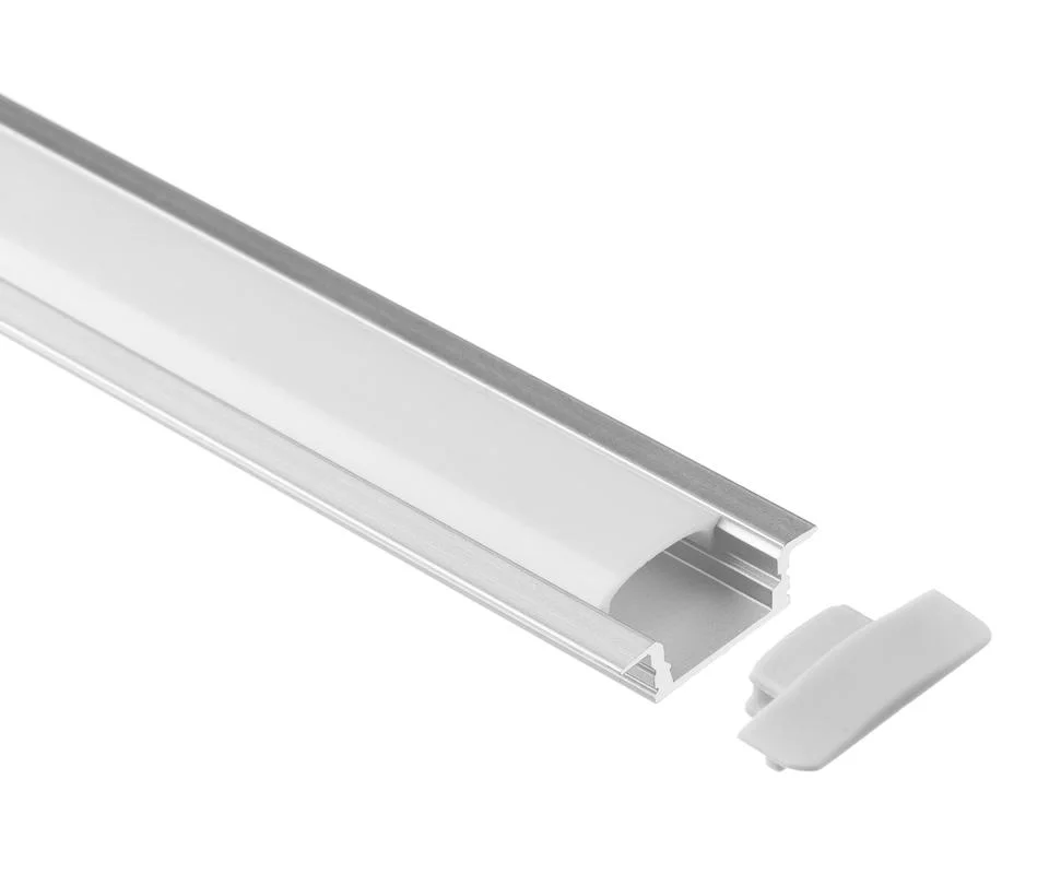 Recessed aluminum LED channel with curved frosted diffuser and snap-fit plastic end cap, designed for seamless linear lighting in cabinetry or architectural applications.