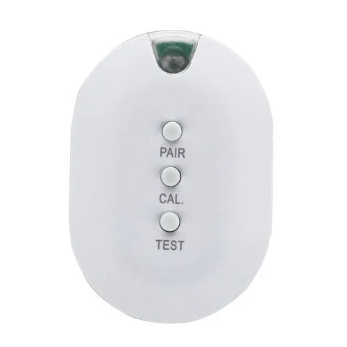 Wireless remote with white casing and three labeled buttons for pairing, calibration, and testing.