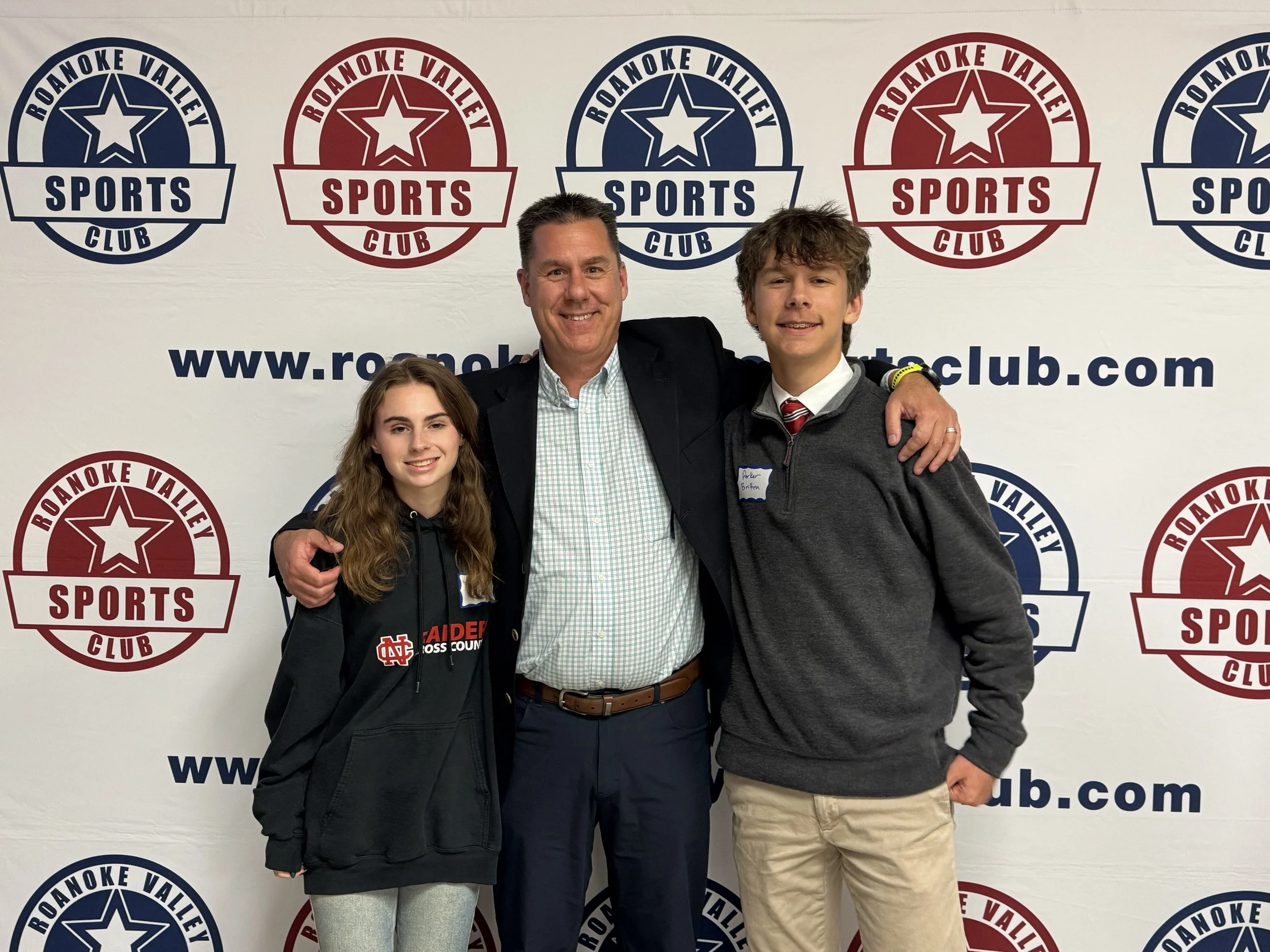  The club honored two State Champion North Cross Track Team members at the March 2026 meeting. Left to right: Ainsley Myles, North Cross Coach Bratton, and Parker Bratton. 