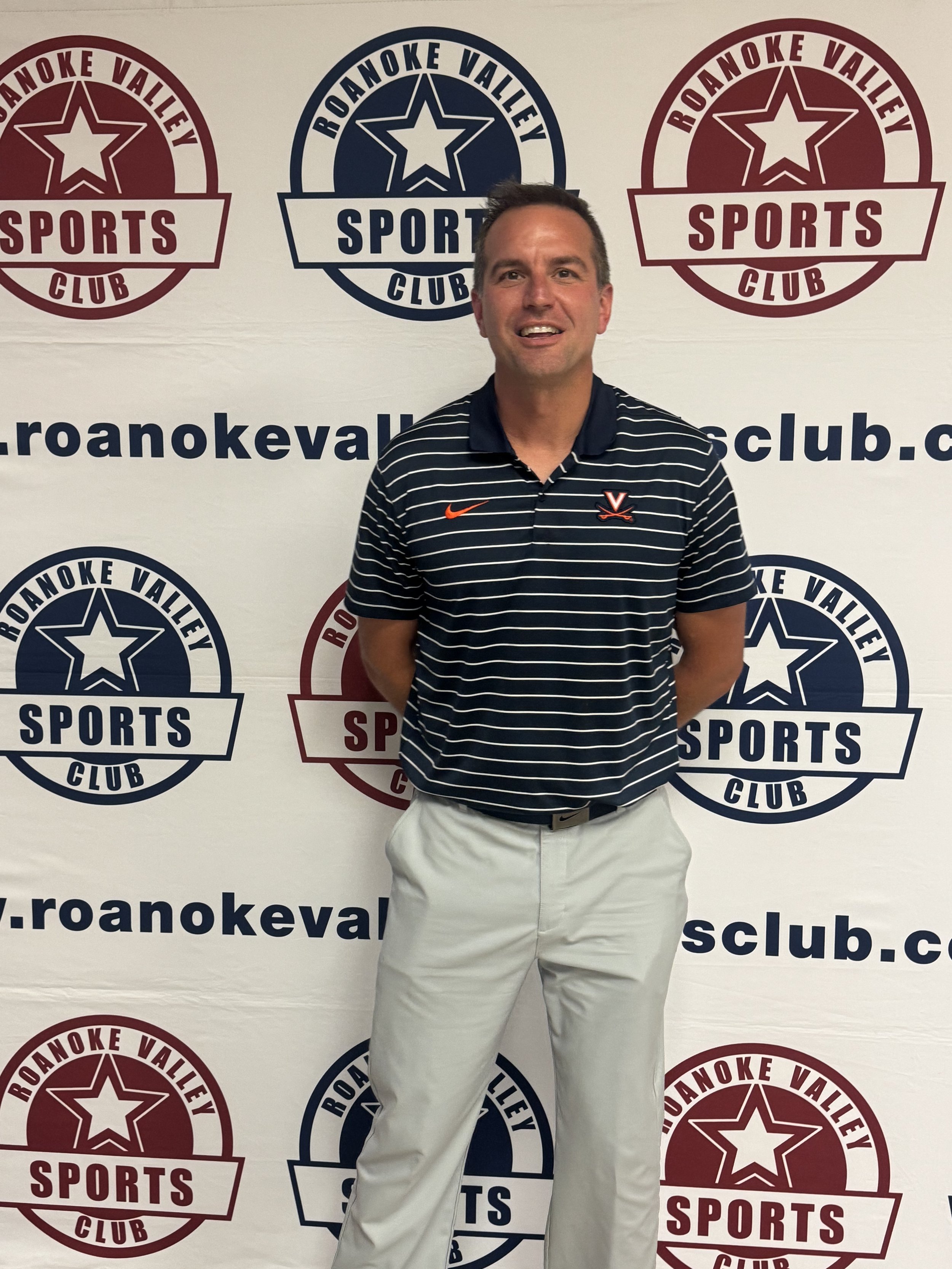 Coach Rousell. 