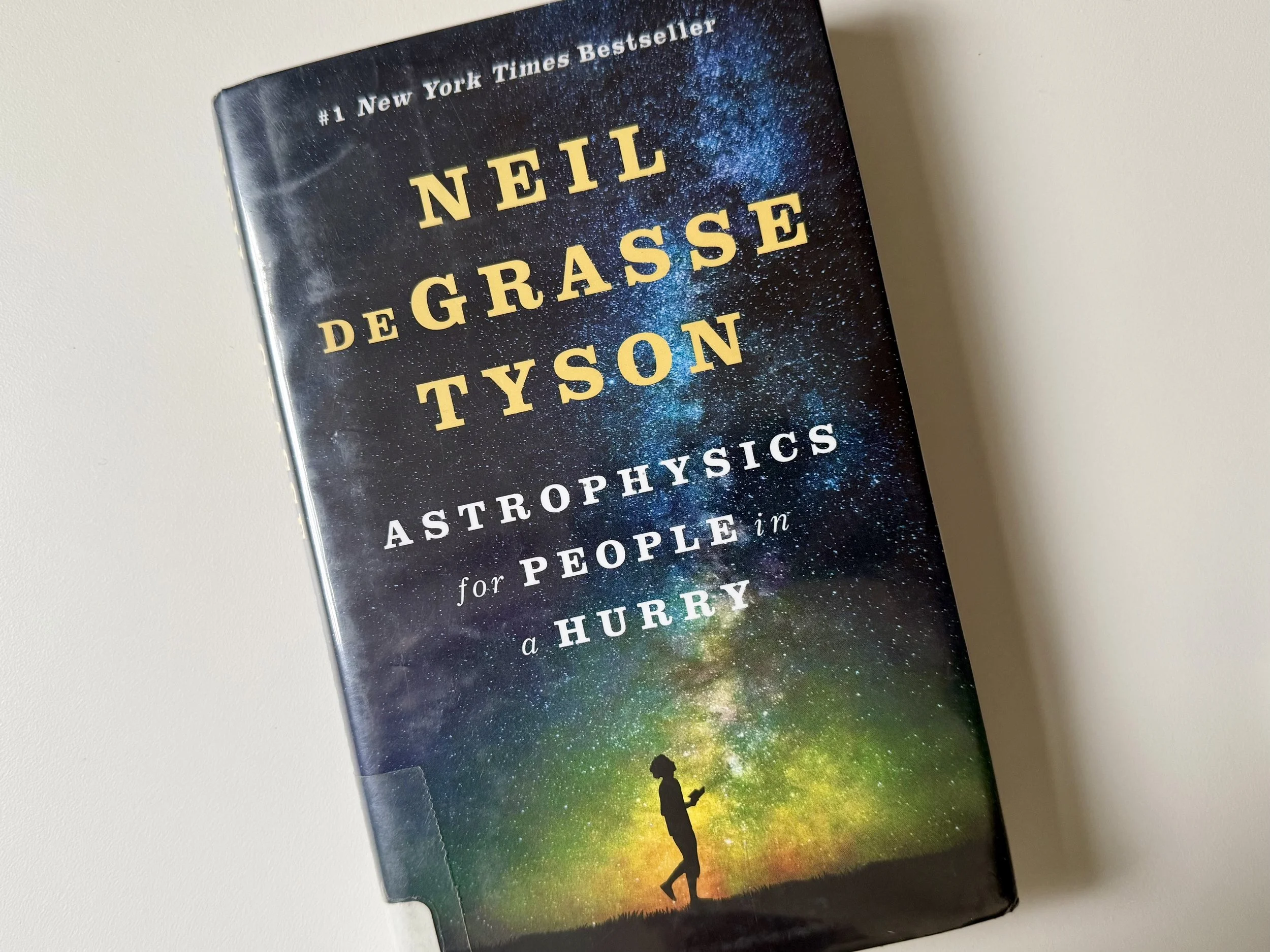 Front cover of Neil deGrasse Tyson's NY Times bestseller, "Astrophysics for People in a Hurry".