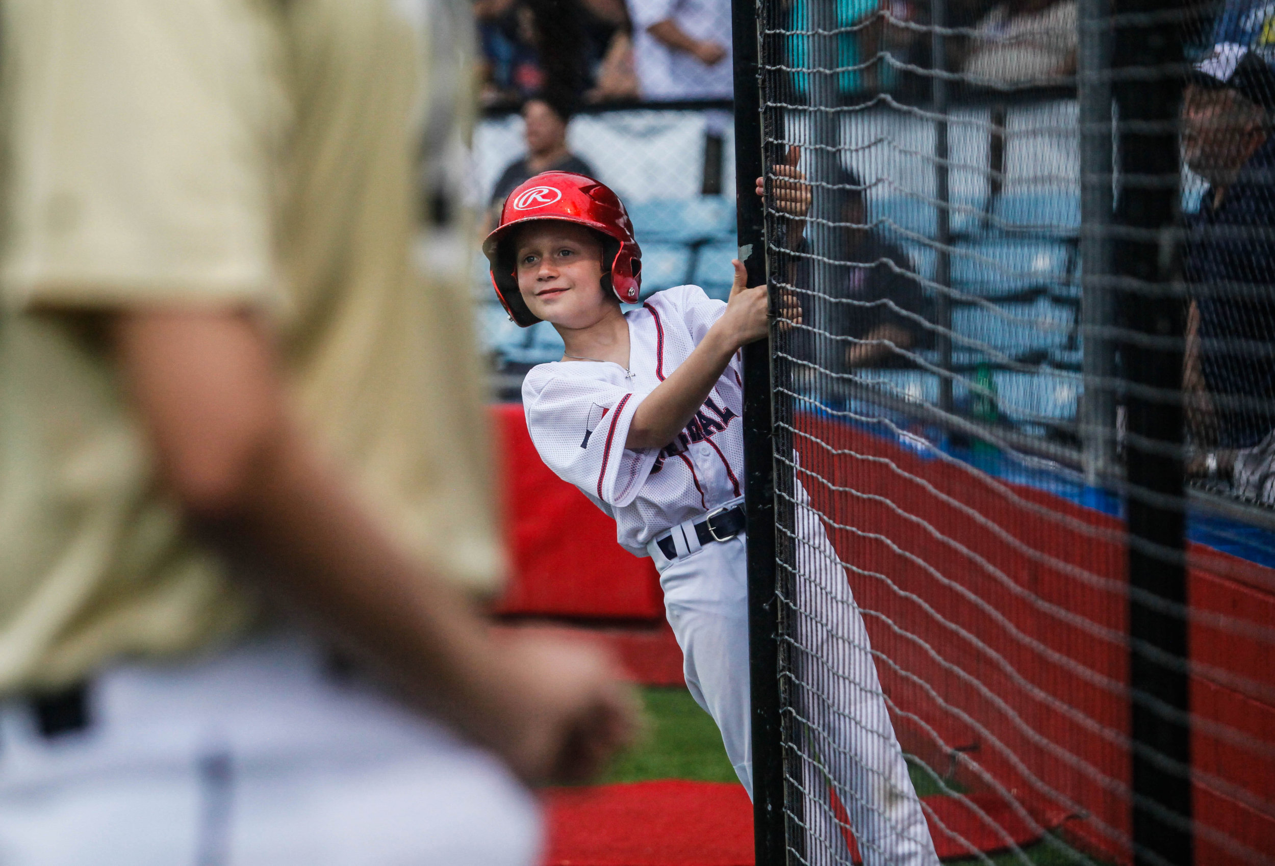  A bat boy watches from the dugout during Saturday’s Victoria Generals vs. Brazos Valley Bombers game at Riverside Stadium in Victoria, Texas on July 14, 2018 