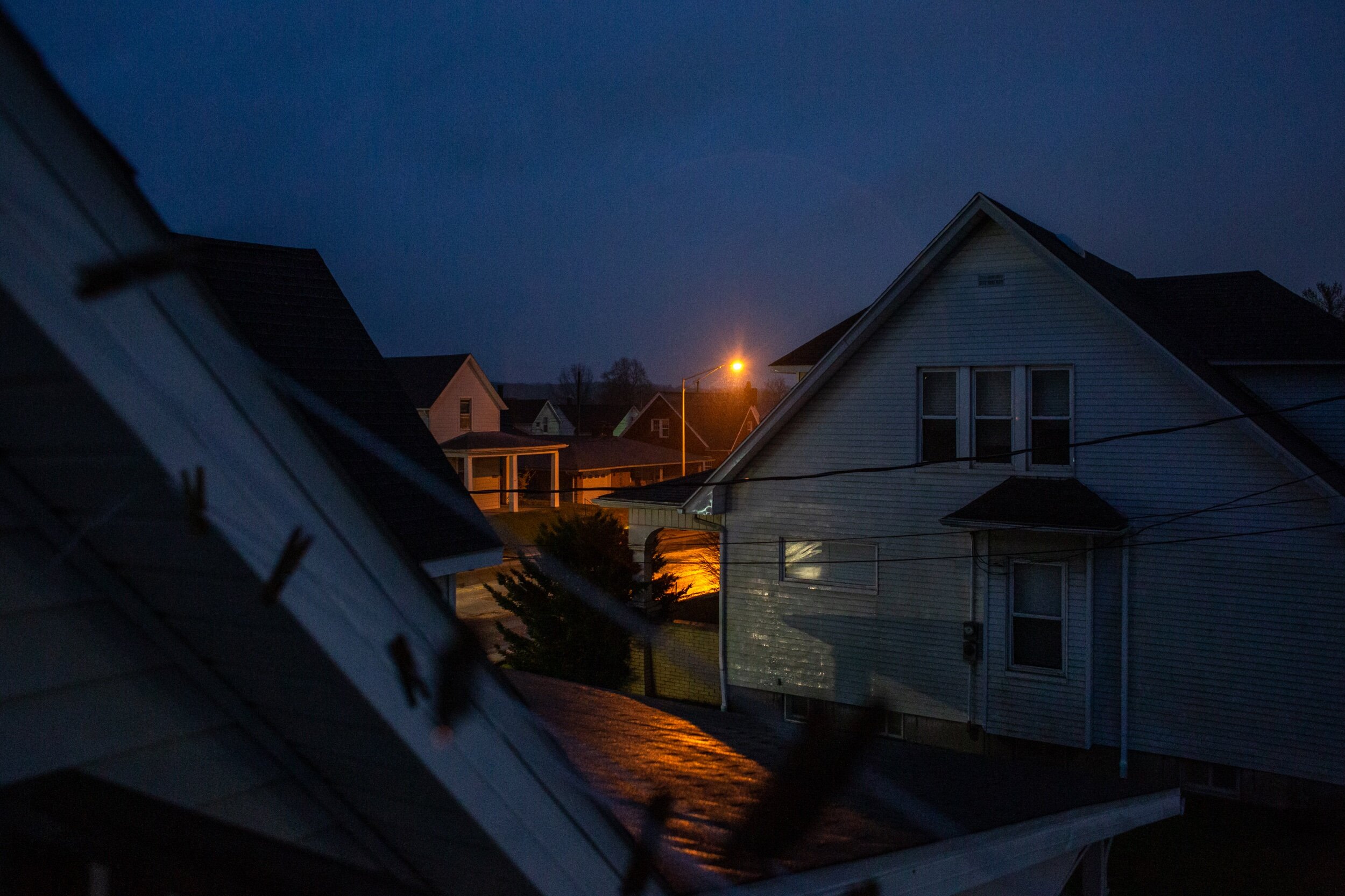 A streetlight on Newton Street glows after the sun set in Jasper on Tuesday, March 24, 2020. 