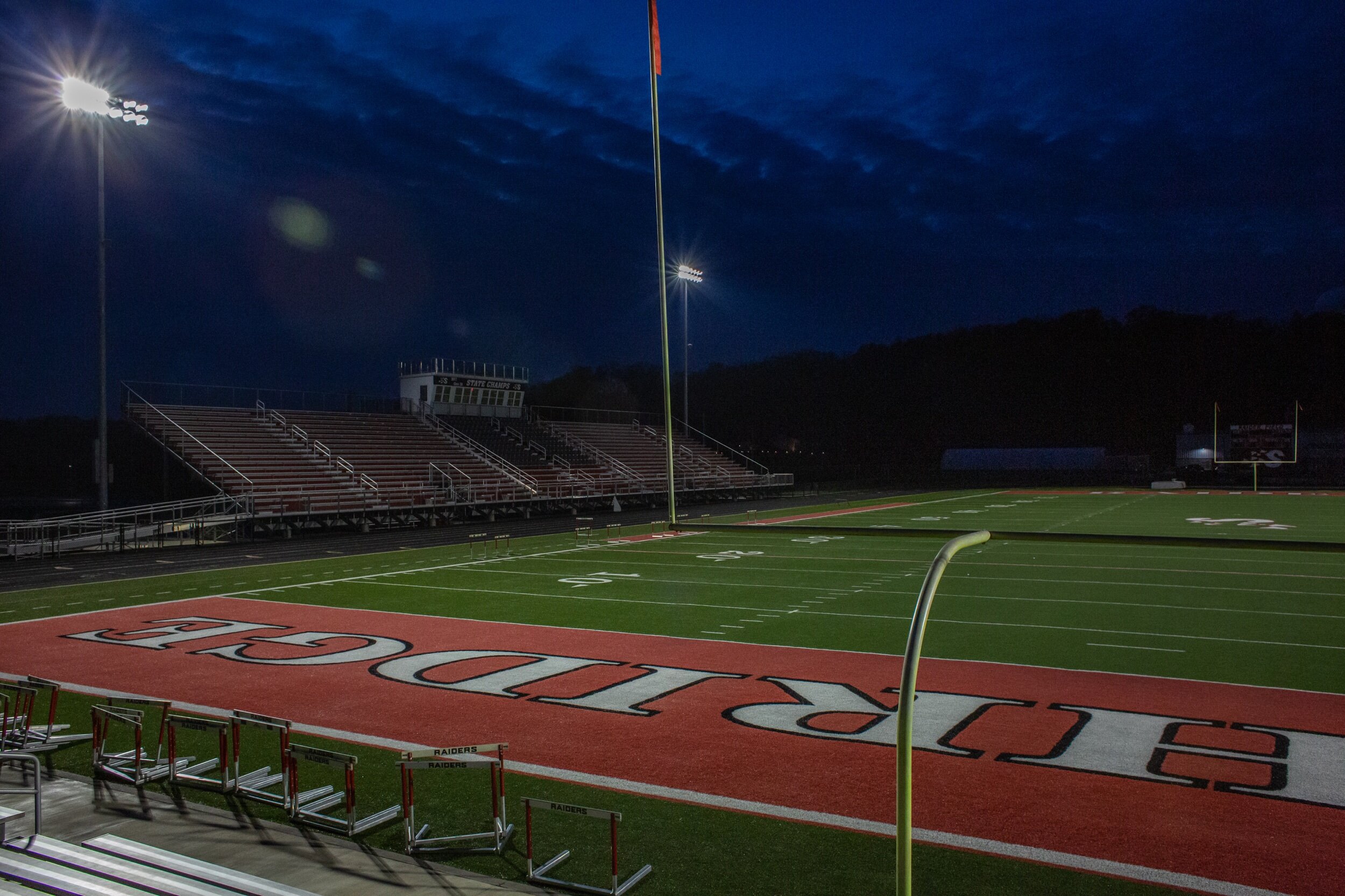 Southridge High School's football stadium lights shine to honor North Central High School athletic director and football coach Paul Loggan, who passed away from COVID-19 on April 12, 2020. Loggan organized the North-South All-Star Game for years.
