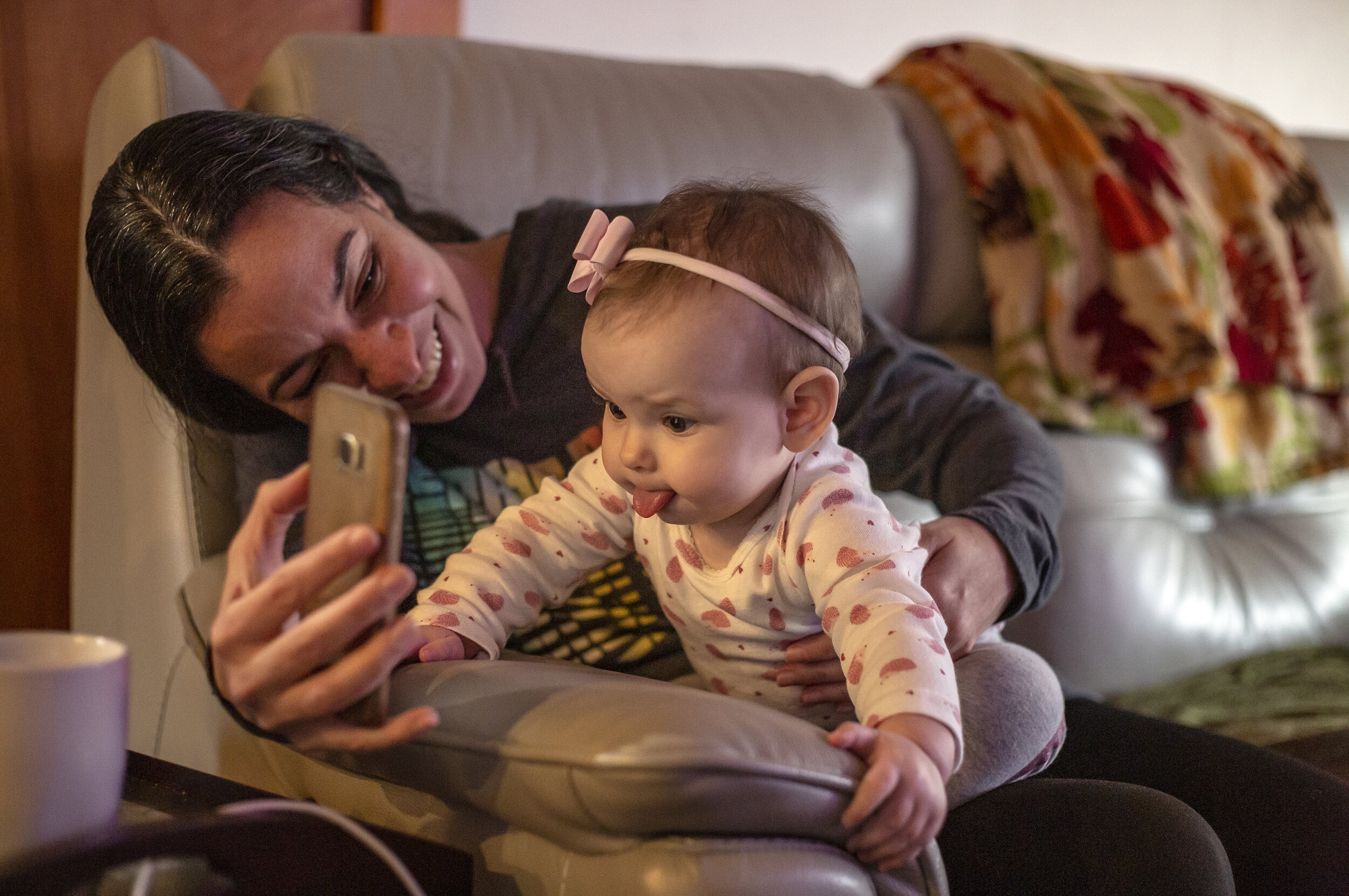  Souza uses FaceTime to show Isadora to her immediate family in Brazil in November. It is difficult for Souza’s parents to watch their first grandchild grow up over phone screen, but Souza looks forward to giving them daily updates on Isadora. 