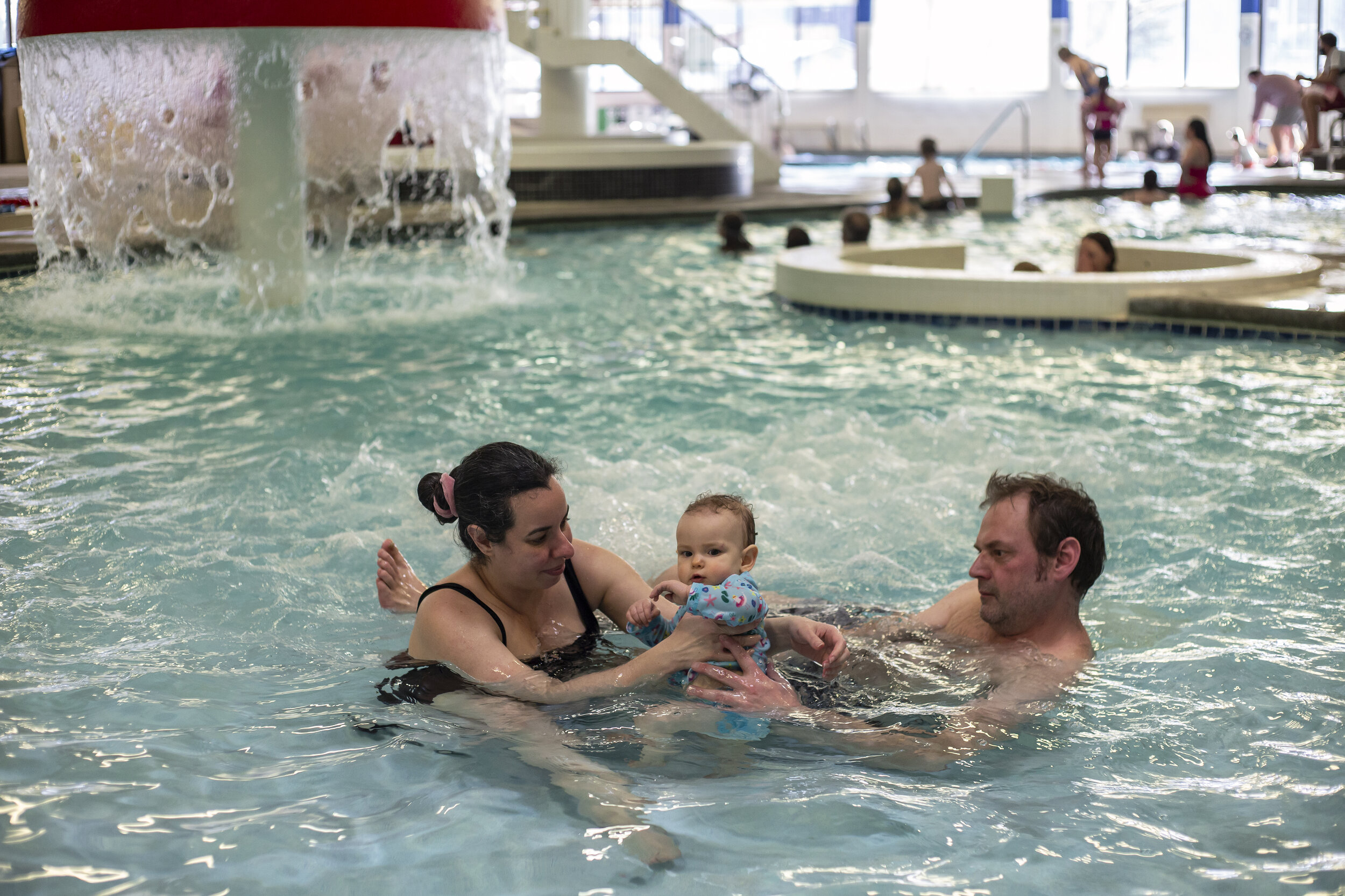  Souza and James Metcalf take Isadora for a swim at the Teton County/Jackson Recreation Center on March 7, a day after her first birthday. Isadora loves playing in the bath, so they decided taking her to the pool would be a good opportunity for her t