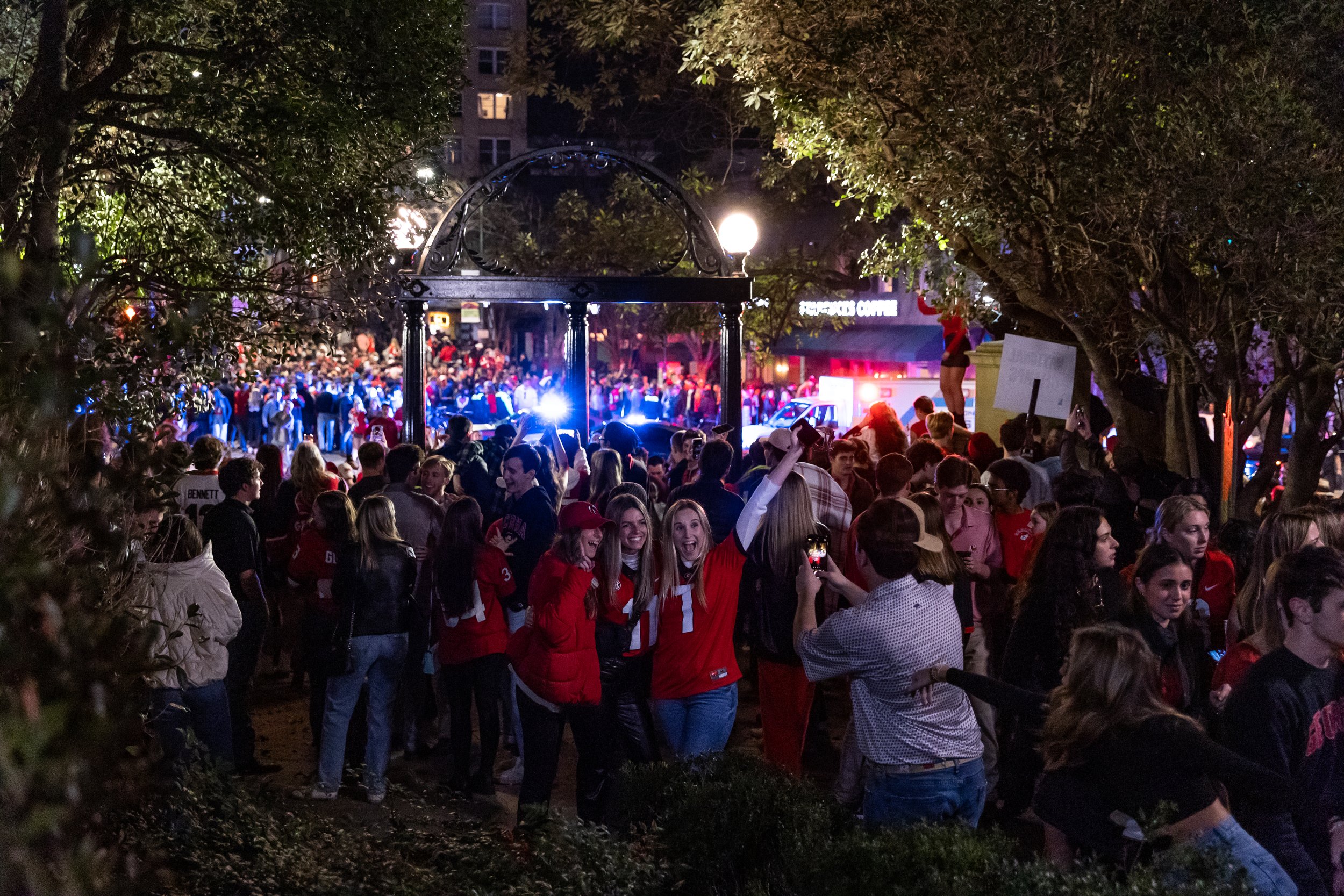  Thousands of UGA fans swarm the Arch in celebration of UGA’s historic victory over TCU during the CFP National Championship, in downtown Athens, Ga., on Monday, Jan. 9, 2023.  