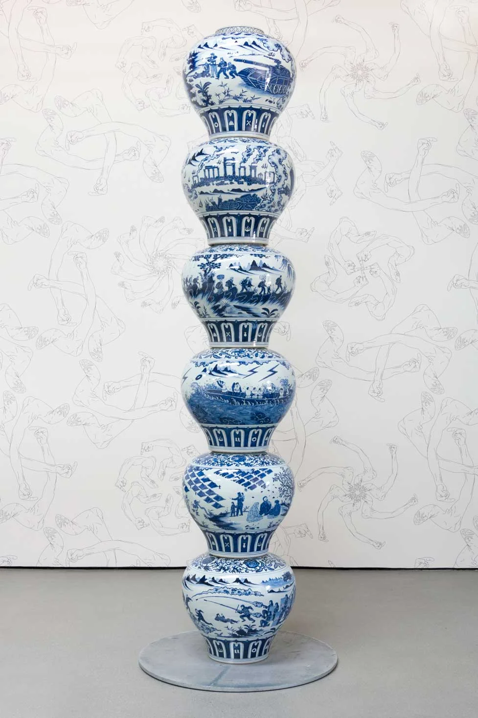 Vases with Refugee Motif as a Pillar (2017) Ai Weiwei Installation view Photo by Jeff Mclane