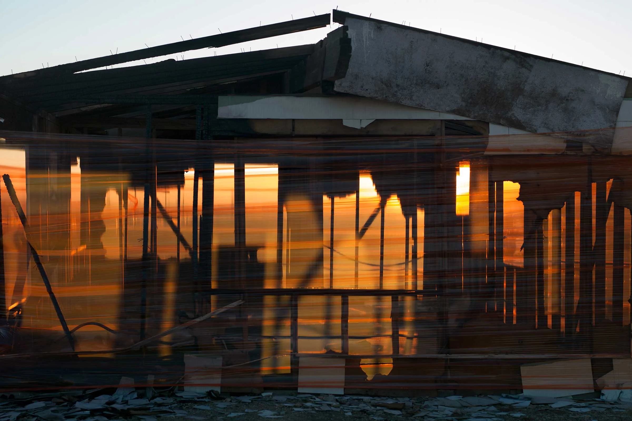 Kelbaker Road , 121cm x 156cm, Archival Pigment Print, 2017 Kim wrapped this dilapidated house in orange tinted wrapping to give a sense of hope to the abandoned structure.