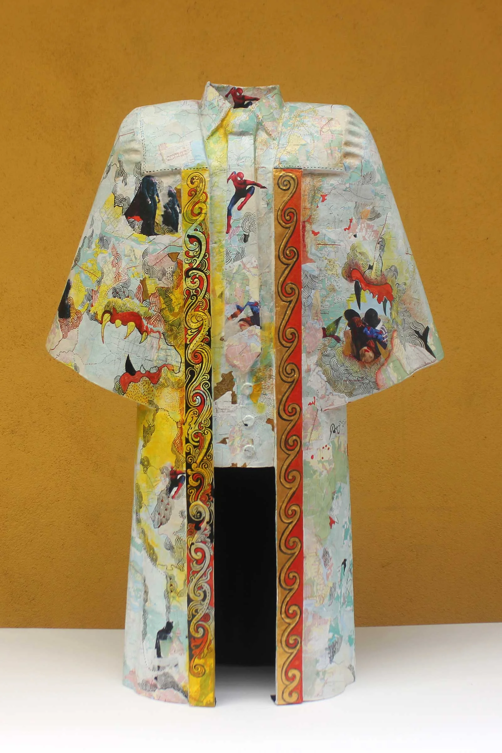 Pala Pothupitiye, This Is Not A Hero's Dress , 2017. Galvanized tar barrel sheets, printed maps, mixed media. 99 x 66 x 28cm