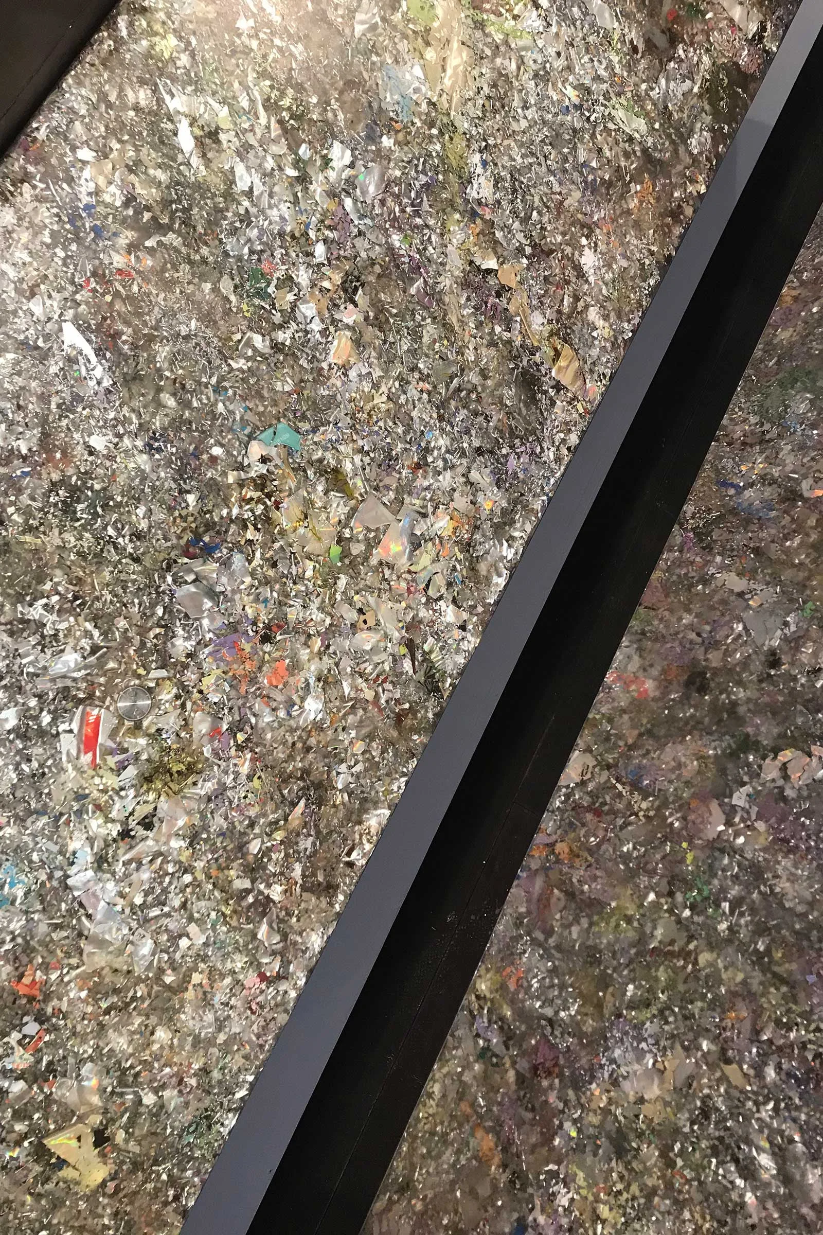 A detail of Dirk Vanderkooij’s holographic bench made from fragmented CD-roms and oyster shells set in resin. Images courtesy of Potato Head