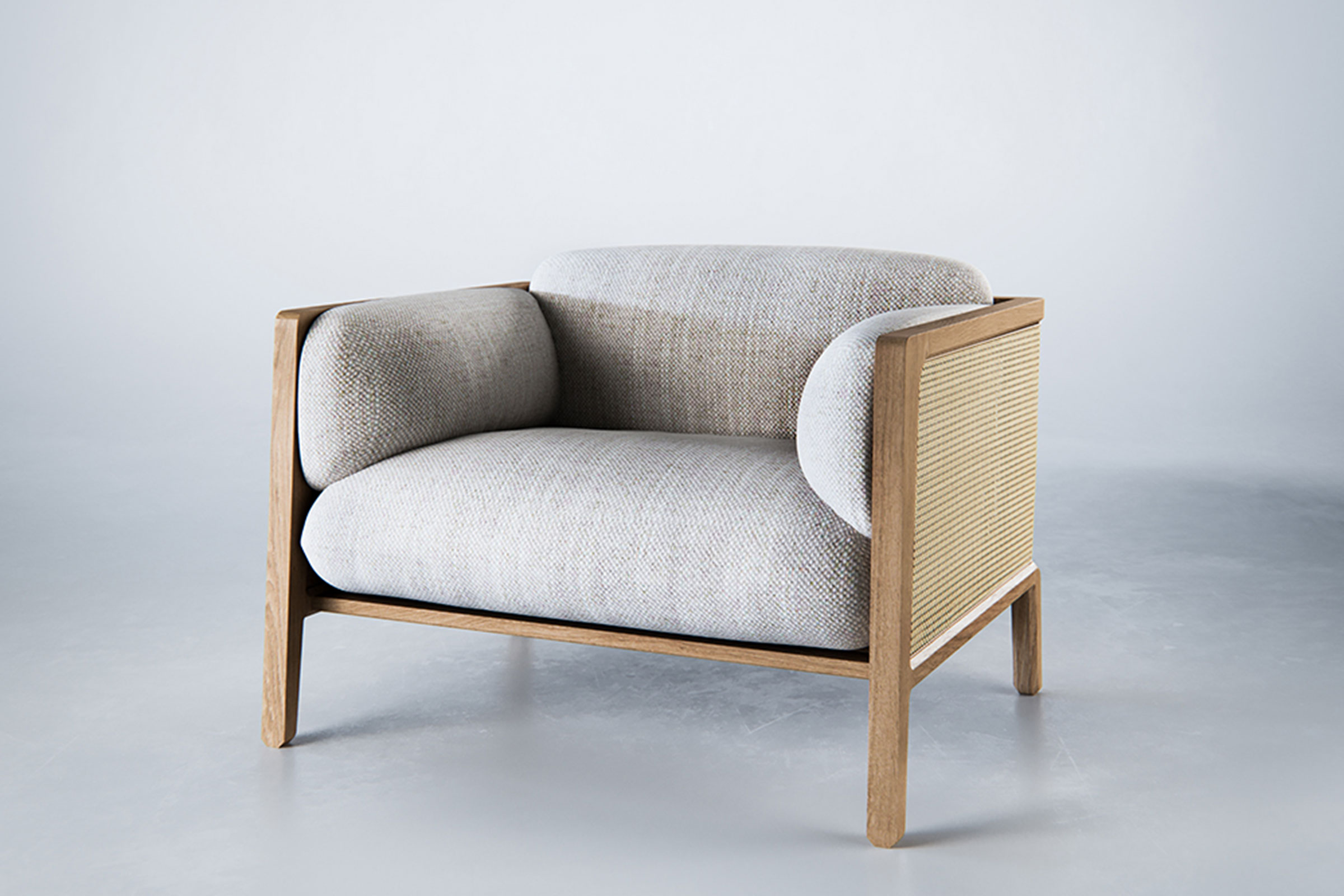   The Wood Room  also placed as a runner-up, and the moody space they created to showcase their product is certainly worth a mention. The combination of rattan and upholstery in the new Trim collection is a winner, too 