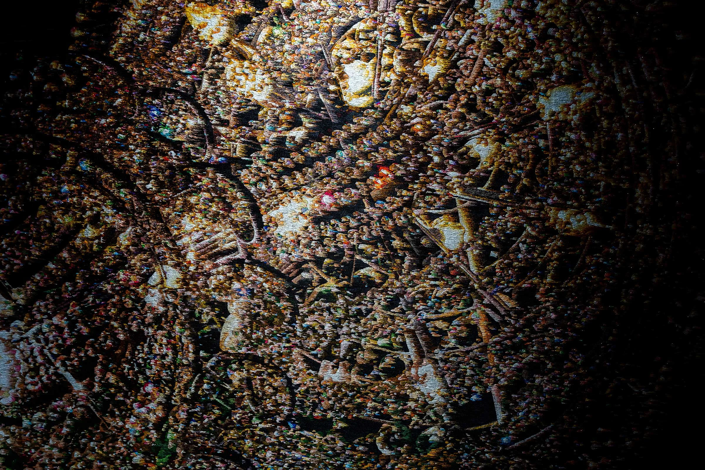 Kyungah Ham, What you see is the unseen / Chandeliers for Five Cities SK 01-04 (detail), 2017-2018. North Korean hand embroidery, silk threads on cotton, middle man, smuggling, bribe, tension, anxiety, censorship, ideology, wooden frame. 165 x 240 cm. Image by Dan Weil. Courtesy of the artists and the Korean Cultural Centre UK