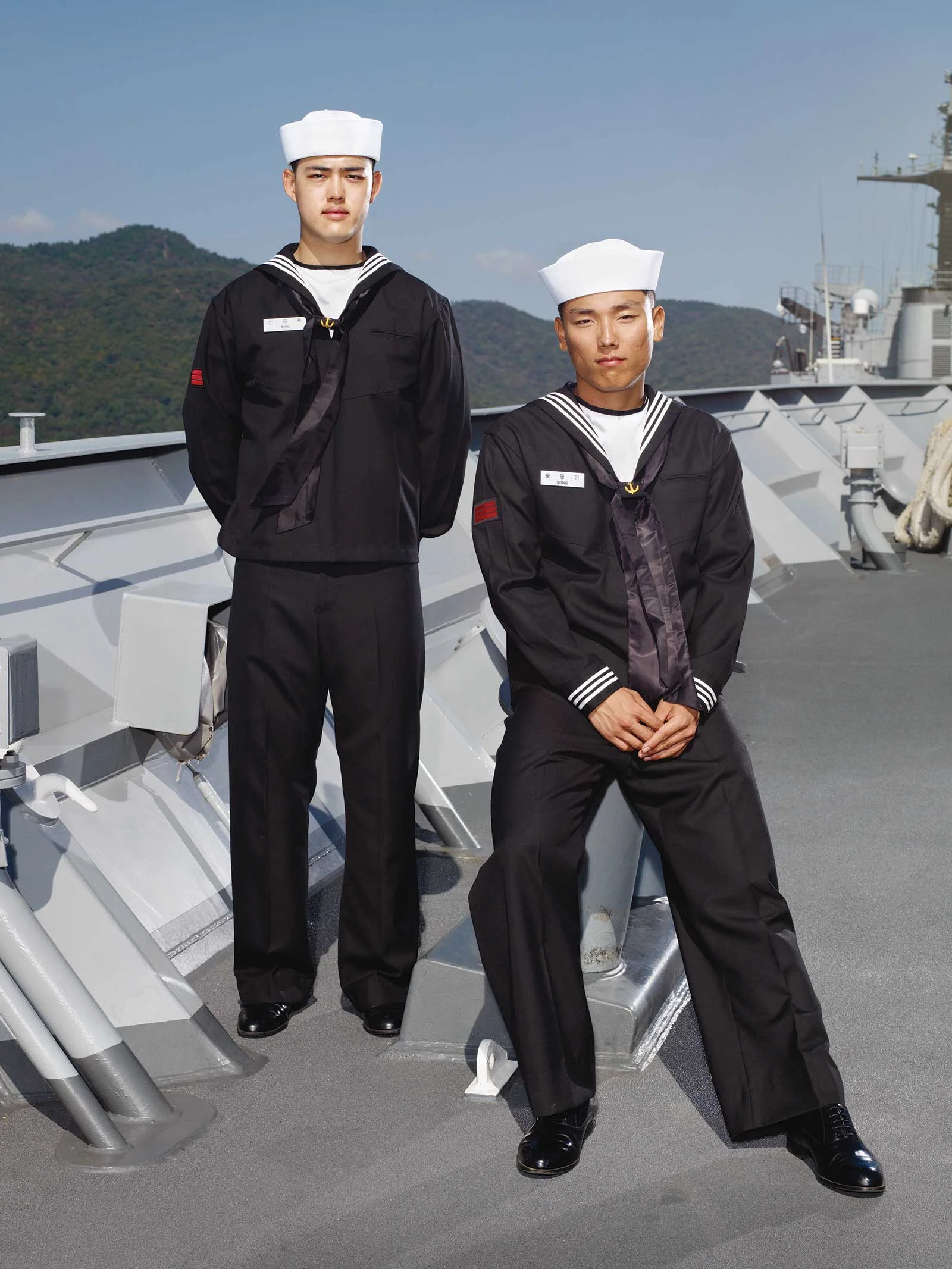 Heinkuhn OH, Two navy corporals wearing black uniforms , October 2010 , 2010. 132 x 105cm, C Print. Image courtesy of the artist