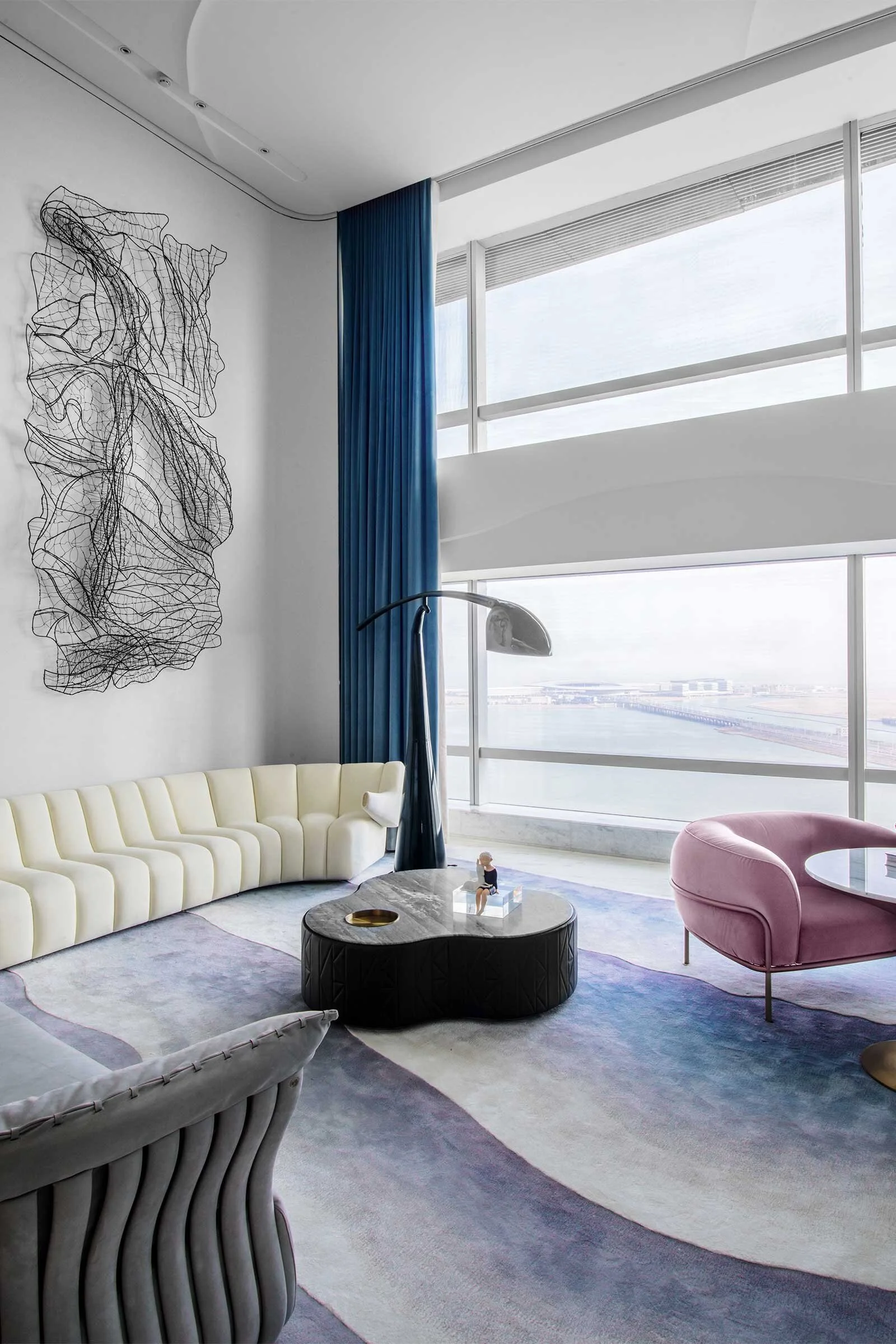 A Curvaceous Coastal Apartment Design Anthology