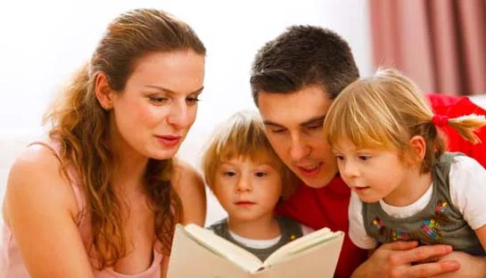 parents-reading-to-two-children1.jpg