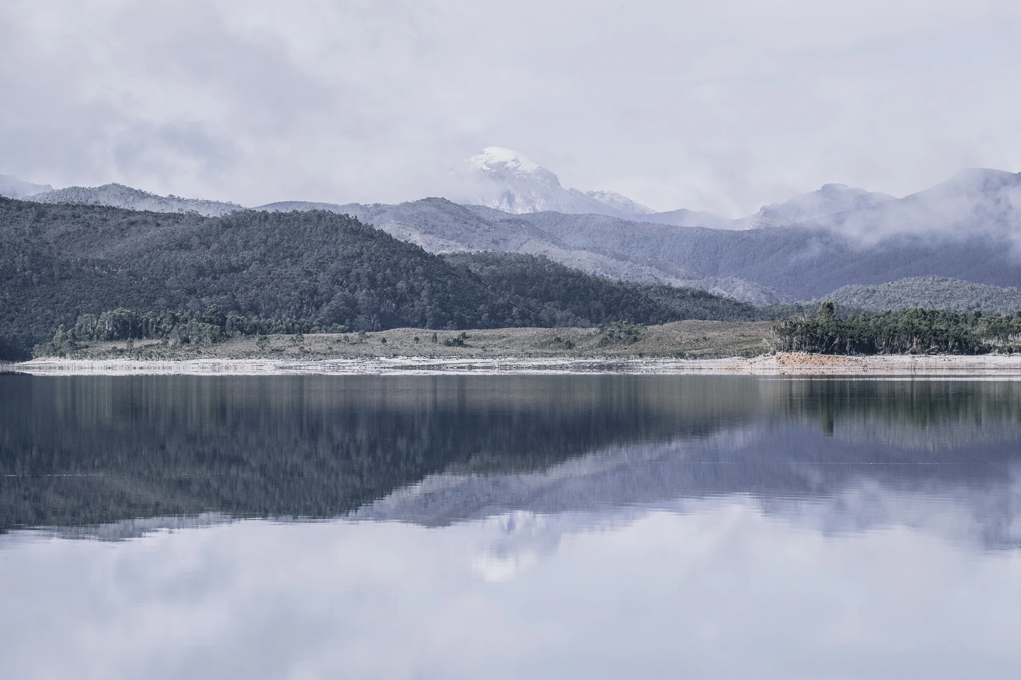 SNOW PEAK Painterly reflections of a mid-winter dusting. Location: South West Tasmania.