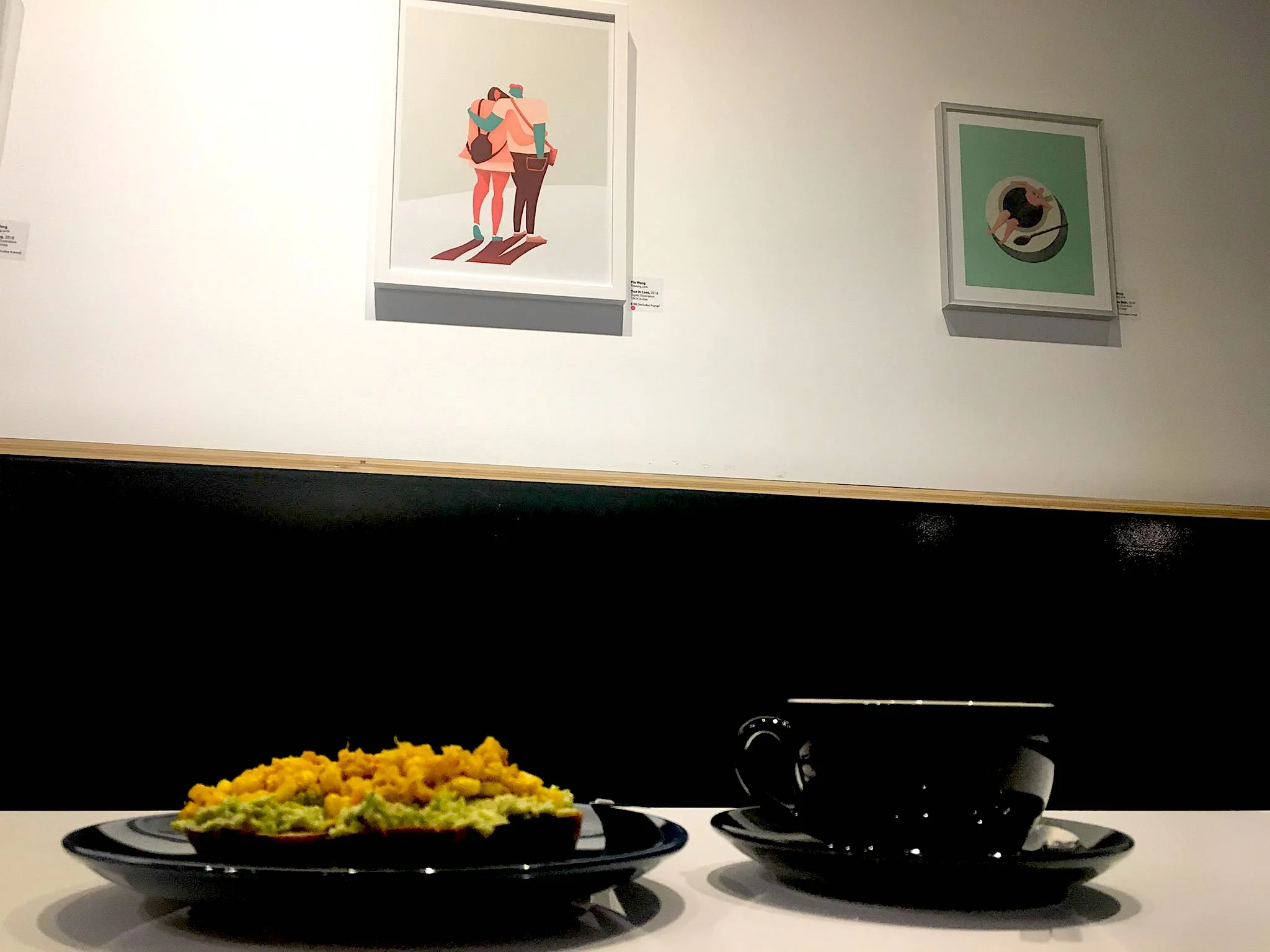 A snapshot of the coffee shop, with my framed images on the walls.