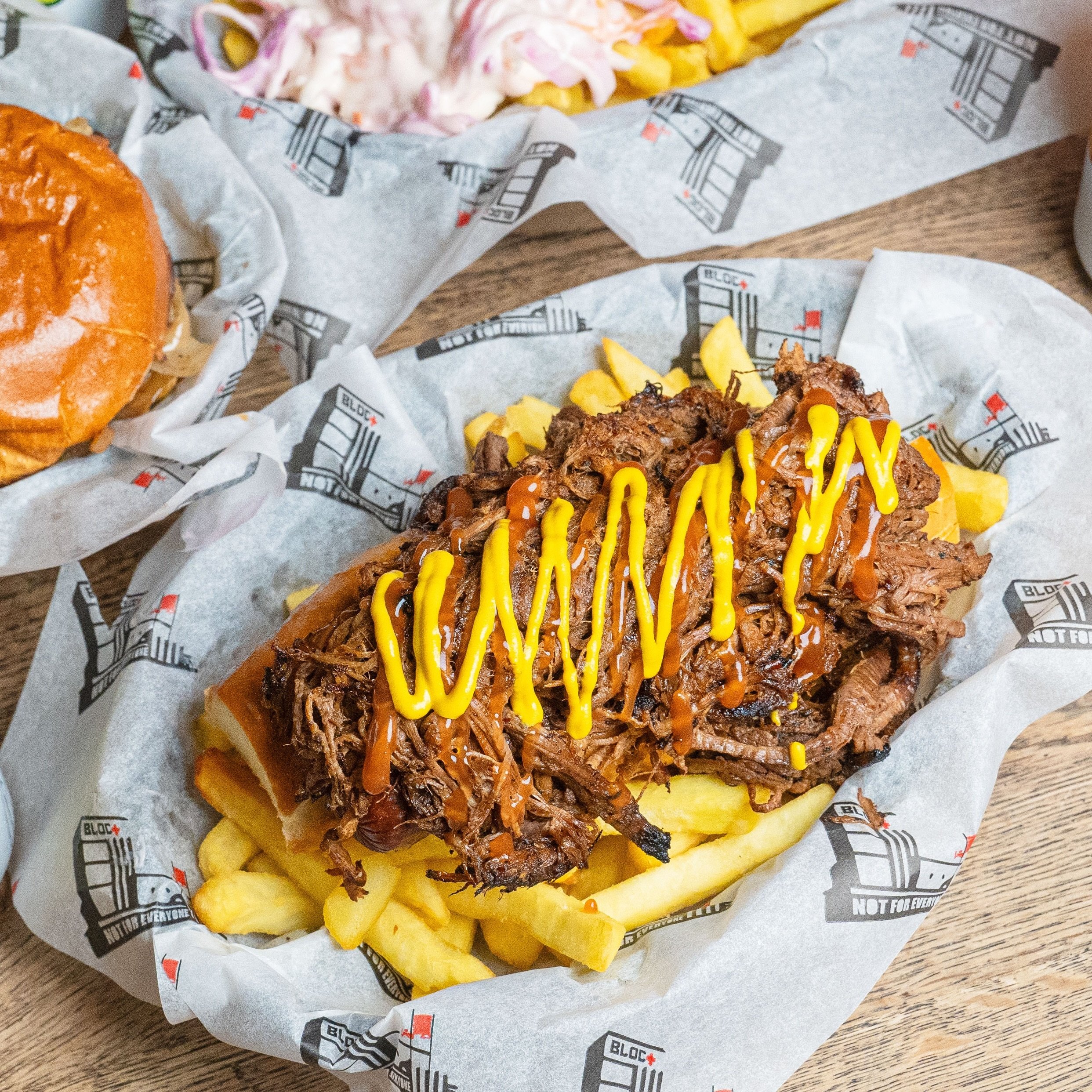 It&rsquo;s heating up for a cheeky BLOC+ Dog Friday 🌭🔥☀️ 6 inch smoked beechwood dog or @moving_mountainsuk vegan dog in a toasted bun served with fries! Load up with double brisket or your favourite toppings, we love to see it 🔥 #blocglasgow