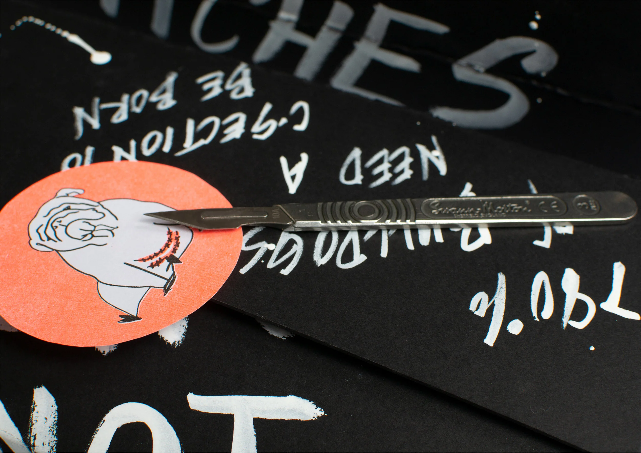 A dark take on the Baby Box, this interactive element is based on the concept of a C-Section. Over 80% of bulldog require the operation to be born. The viewer is invited to cut through the bulldog sticker to access the contents. Inside is equipment often used in the veterinary profession when dealing with flat-faced dogs.