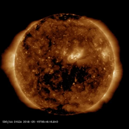 Solar wind flowing from the indicated coronal hole could reach Earth on May 17th. Credit: SDO/AIA