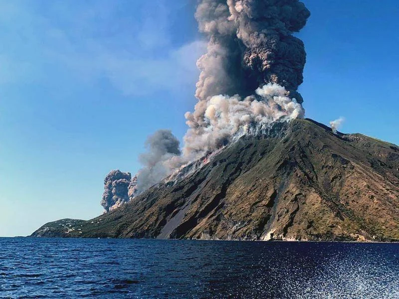 The erupting volcano on the Italian island of Stromboli has sent a huge cloud of ash into the sky.