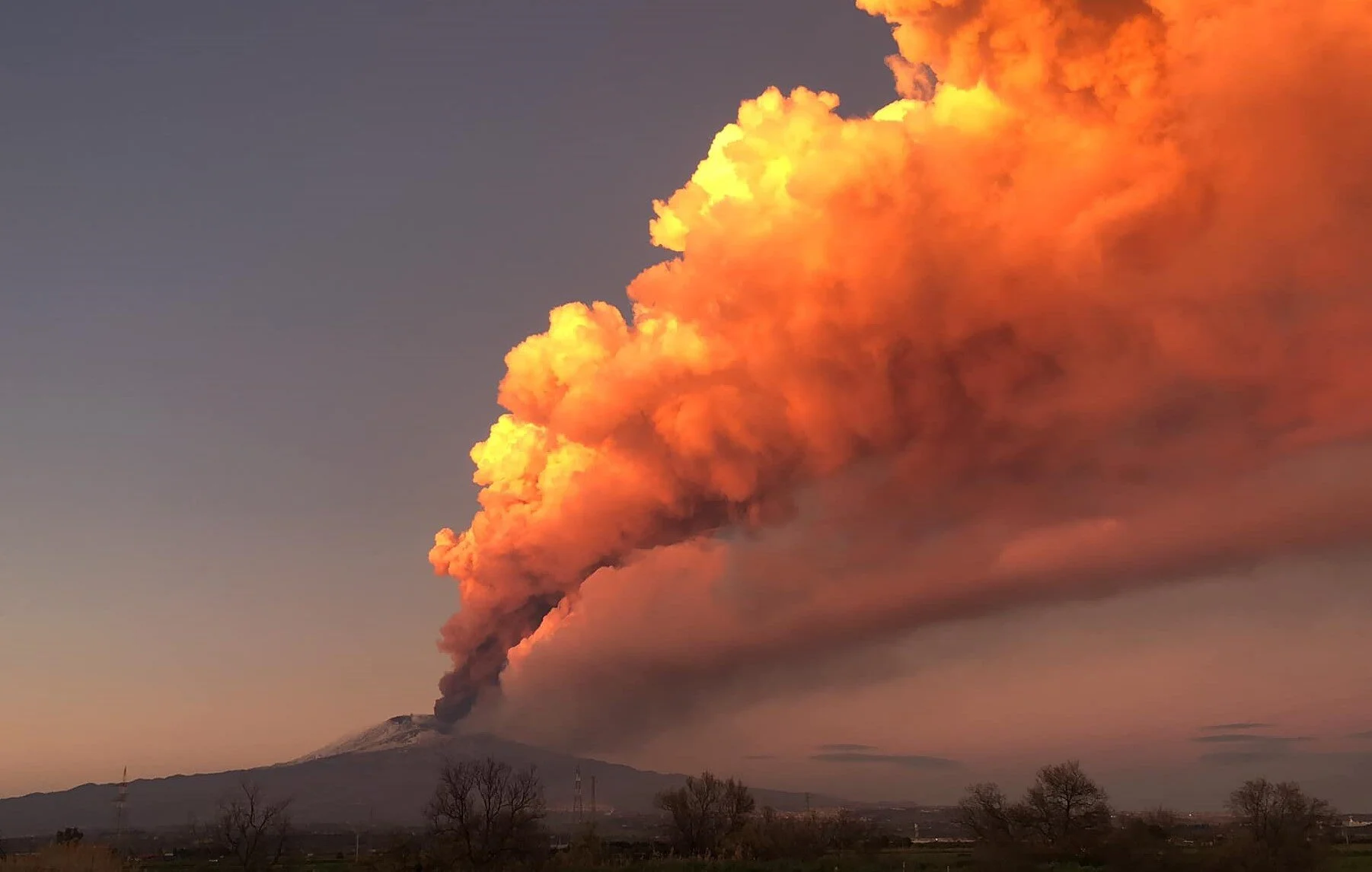 Spectacular Mount Etna erupts sending ash and smoke into the atmosphere 