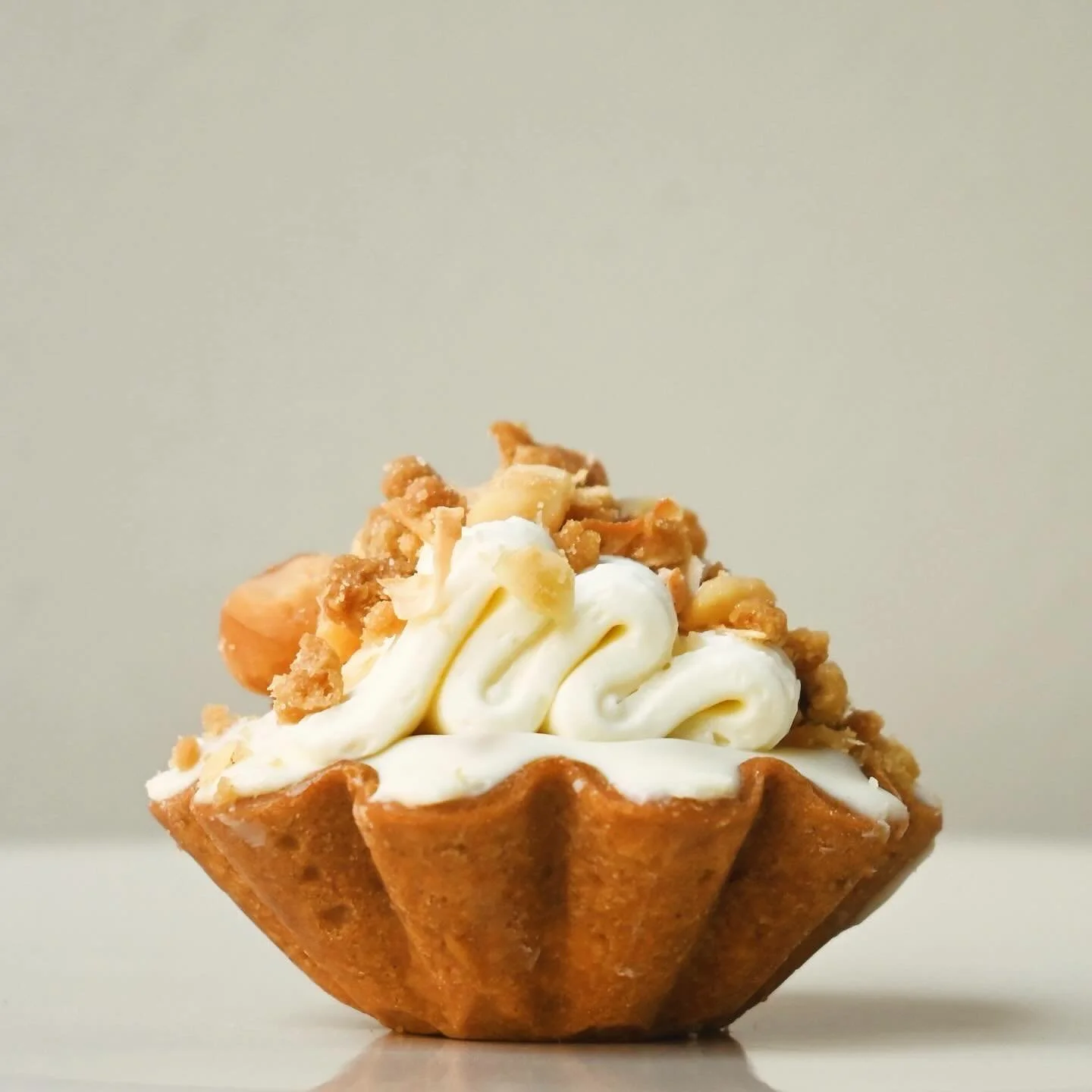Mango, coconut + macadamia tart back this week 🥭