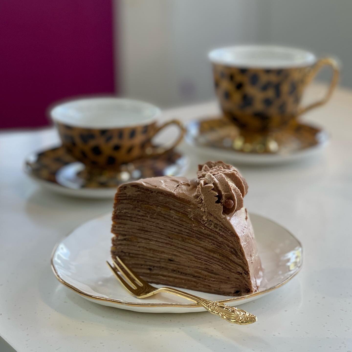 SALTED CARAMEL &amp; MILK CHOCOLATE CREPE CAKE pictured with some very gorgeous teacups that arrived this week. Coming soon to our gift range along with lots of other beauties. 

#ilumafinefoods #westleederville #perthfoodies #perthtea #perthhightea 