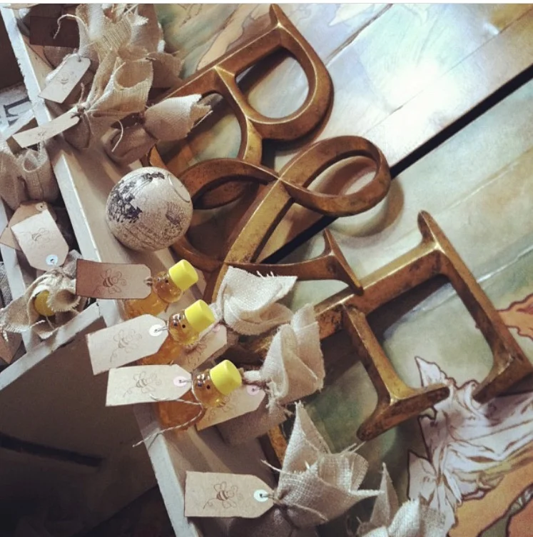 This was for a family wedding and the honey bears were bare and wrapped in burlap to add character to the display.